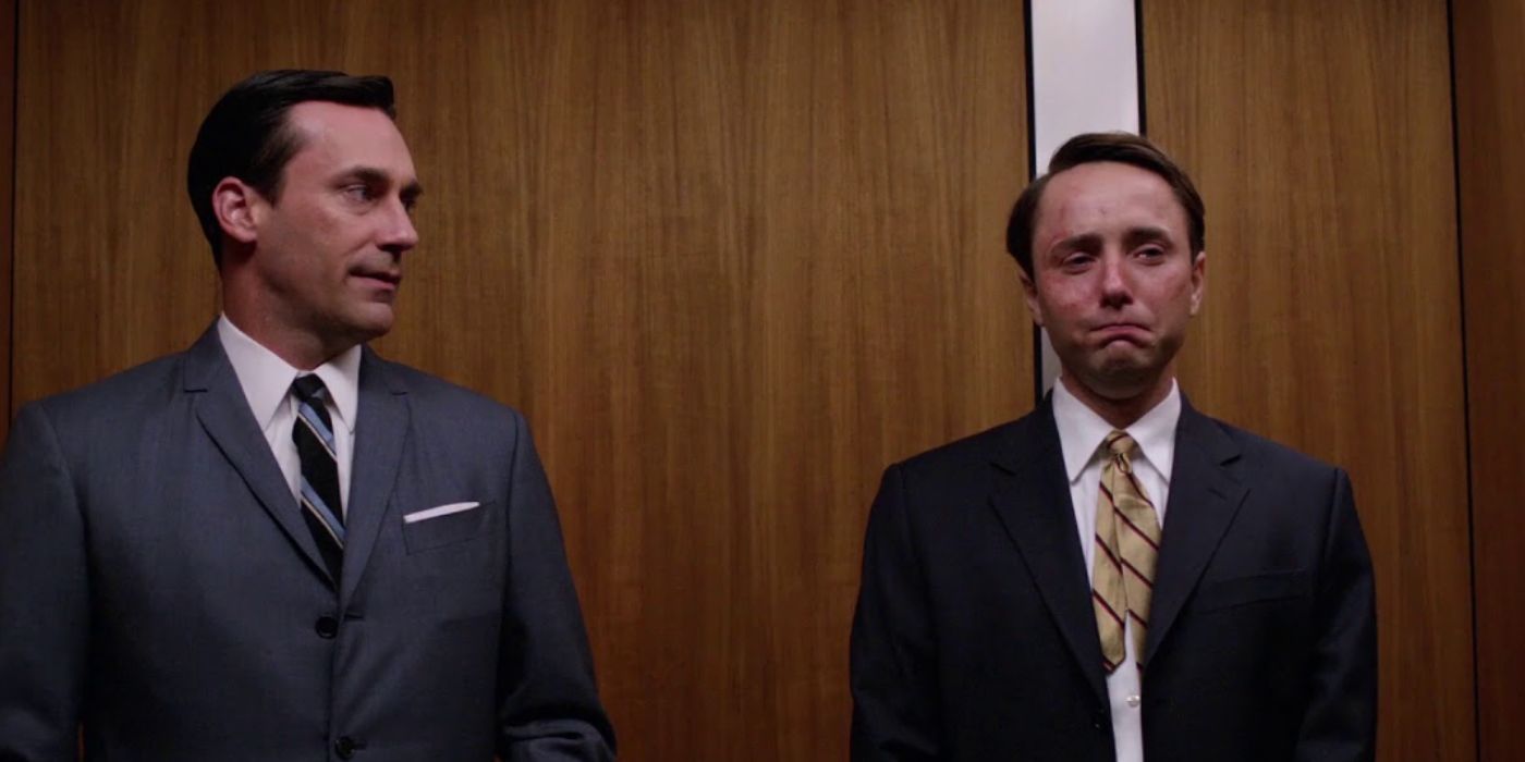 Jon Hamm and Vincent Kartheiser as Don and Pete, crying in the elevator in 'Mad Men'