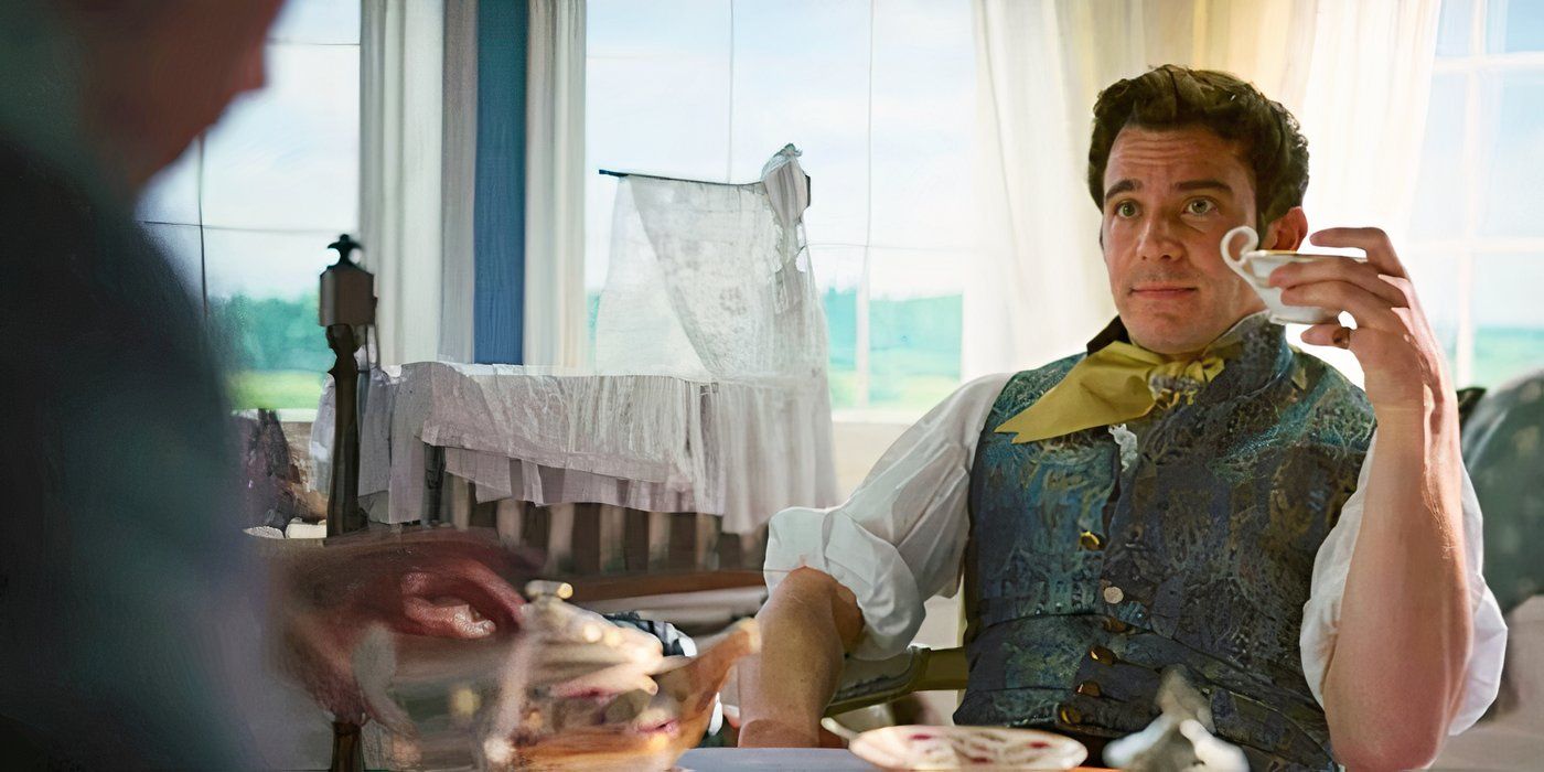 Benedict (Luke Thompson) sitting at a table drinking a cup of opium tea in Bridgerton