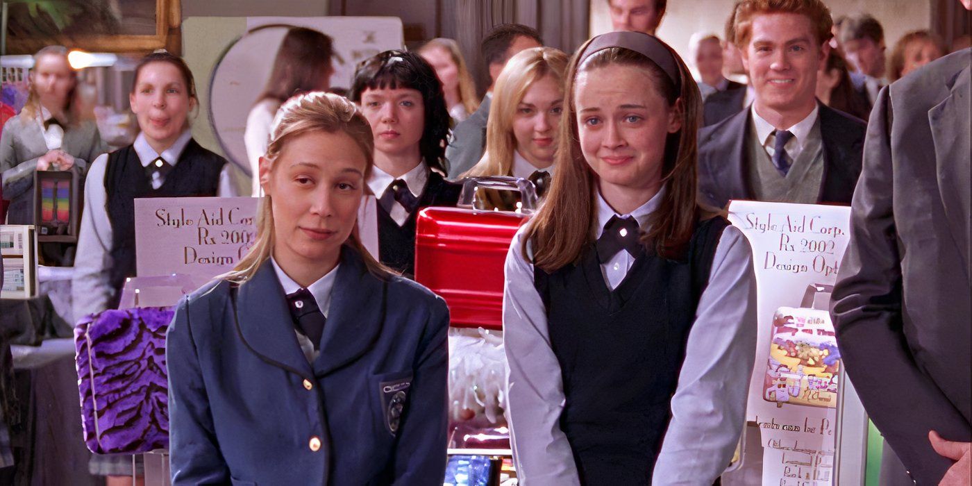 Liza Weil and Alexis Bledel as Paris and Rory in their Chilton uniforms and smiling on Gilmore Girls.