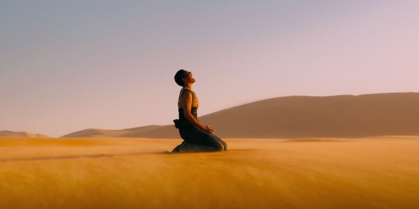 Furiosa (Charlize Theron) reacts in rage and sadness during a key scene in Mad Max: Fury Road (2015).