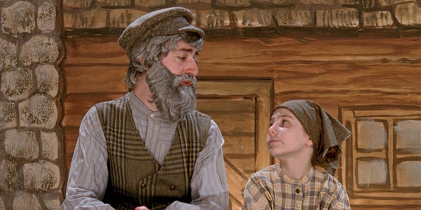 Sean Gunn as Kirk Gleason, wearing a fake beard and performing with a young girl in a production of Fiddler on the Roof on Gilmore Girls