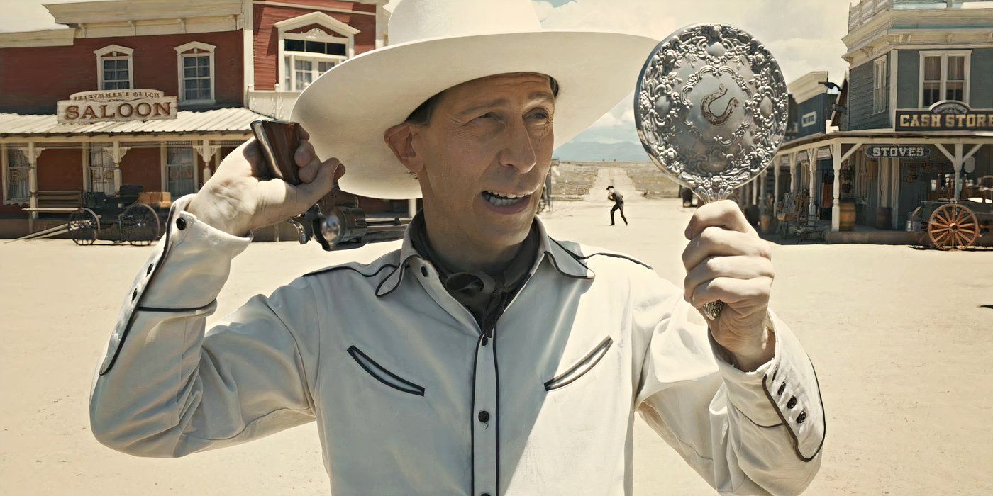 Tim Blake Nelson as Buster Scruggs, looking in a mirror and pointing a gun behind him in The Ballad of Buster Scruggs