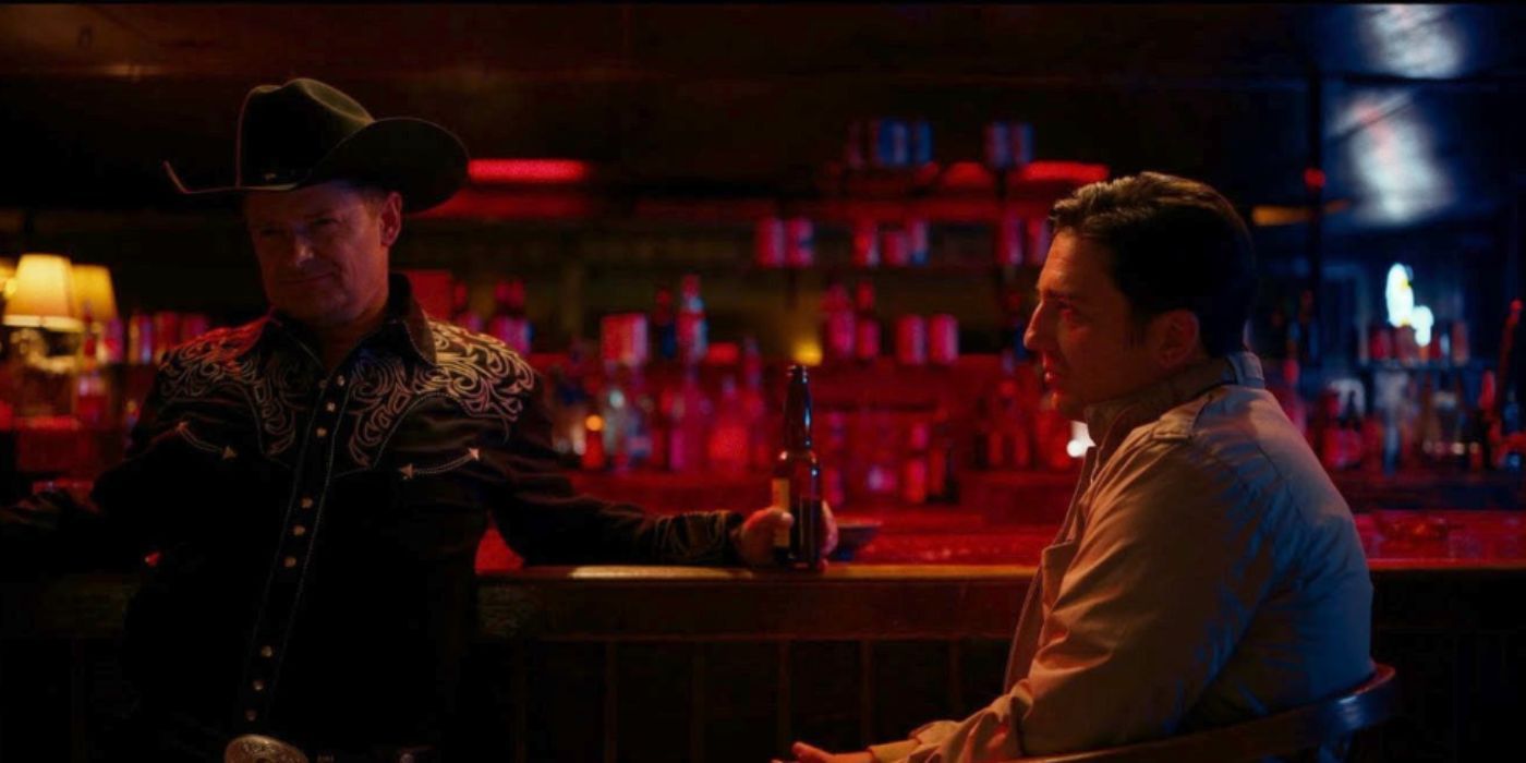 Steve Zahn as Skip and James Magaro as Ray sitting in a dark bar holding a beer in 'Laroy, Texas'