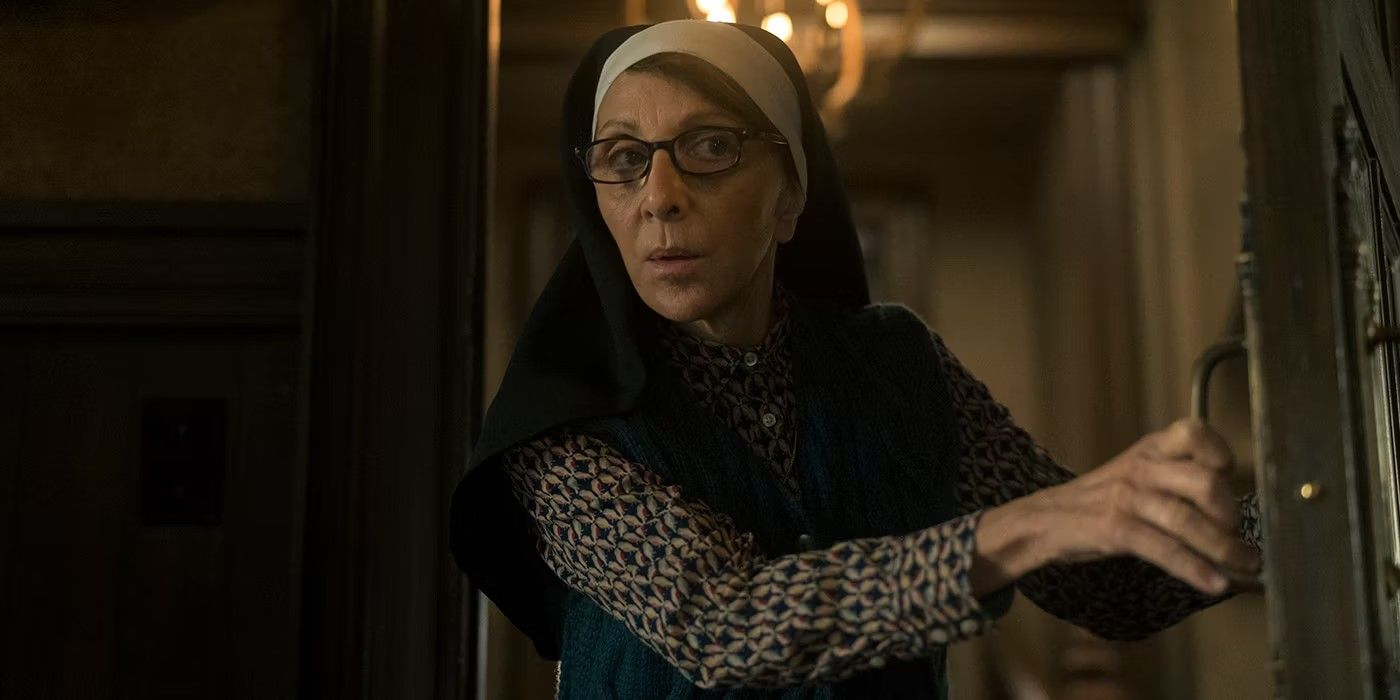 Sister Andrea (Andrea Martin) walks cautiously through a door in &lsquo;Evil&rsquo; Season 3
