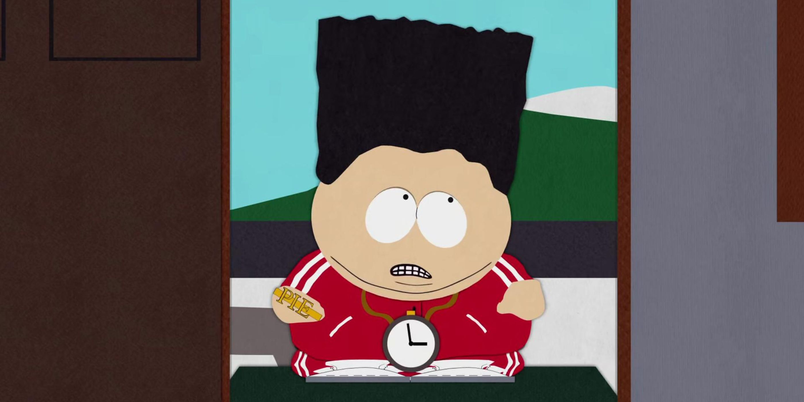 Eric Cartman wears a red tracksuit, clock necklace, and a black afro in 'South Park' Season 1, Episode 13 "Cartman's Mom Is a Dirty Slut" (1998).