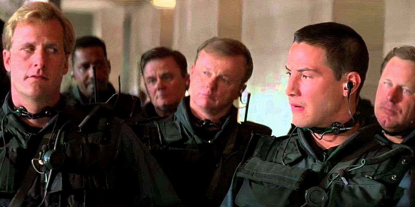 Jeff Daniels and Keanu Reeves surrounded by fellow cops in 'Speed'