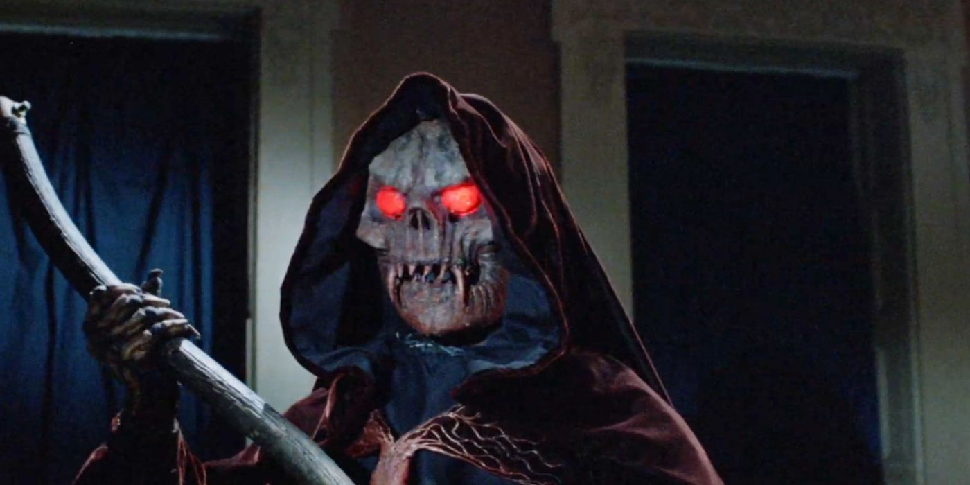 A grim reaper with glowing red eyes in the film "Spookies"
