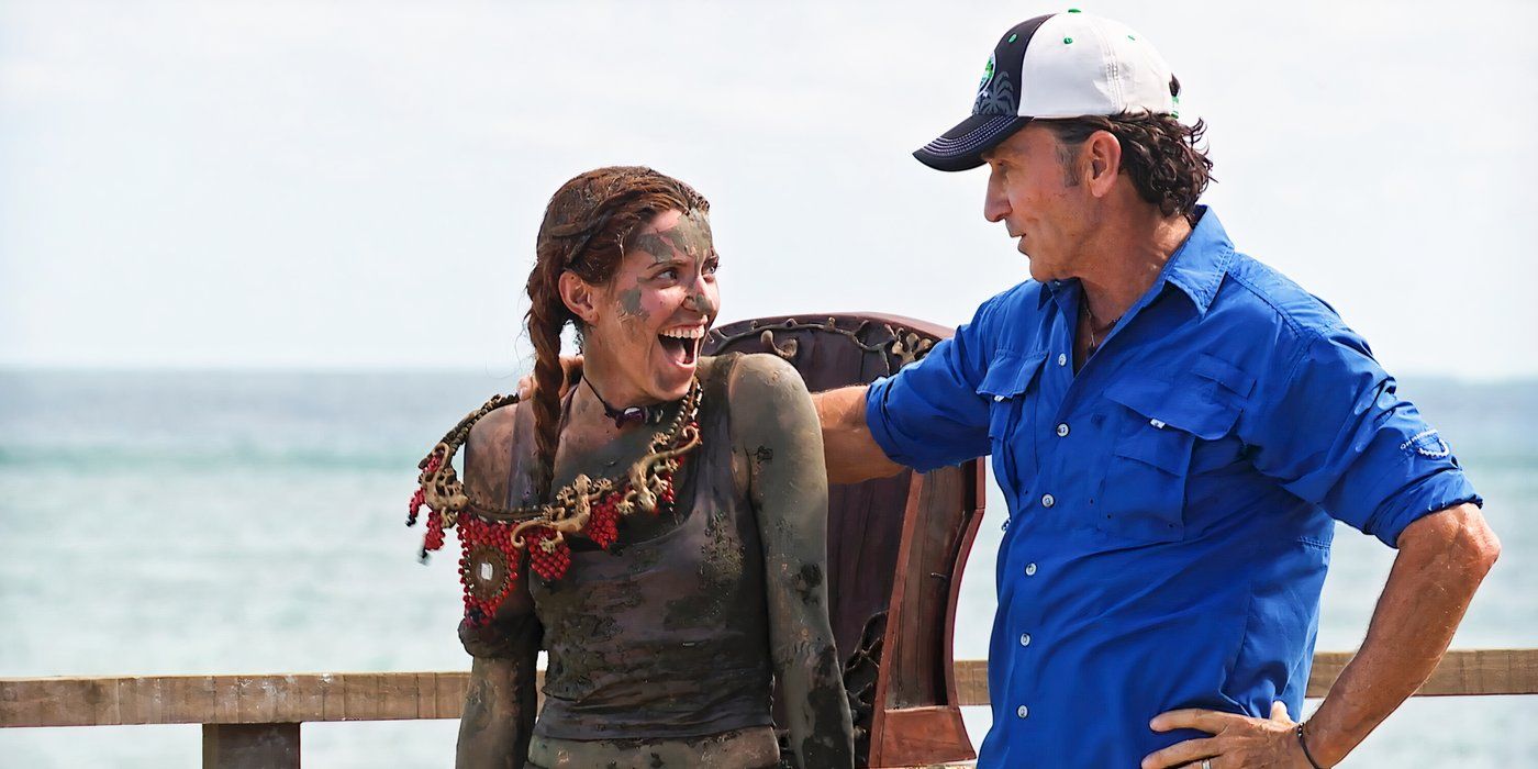 Kenzie Petty wears the immunity necklace covered in mud next to Jeff Probst on 'Survivor 46'