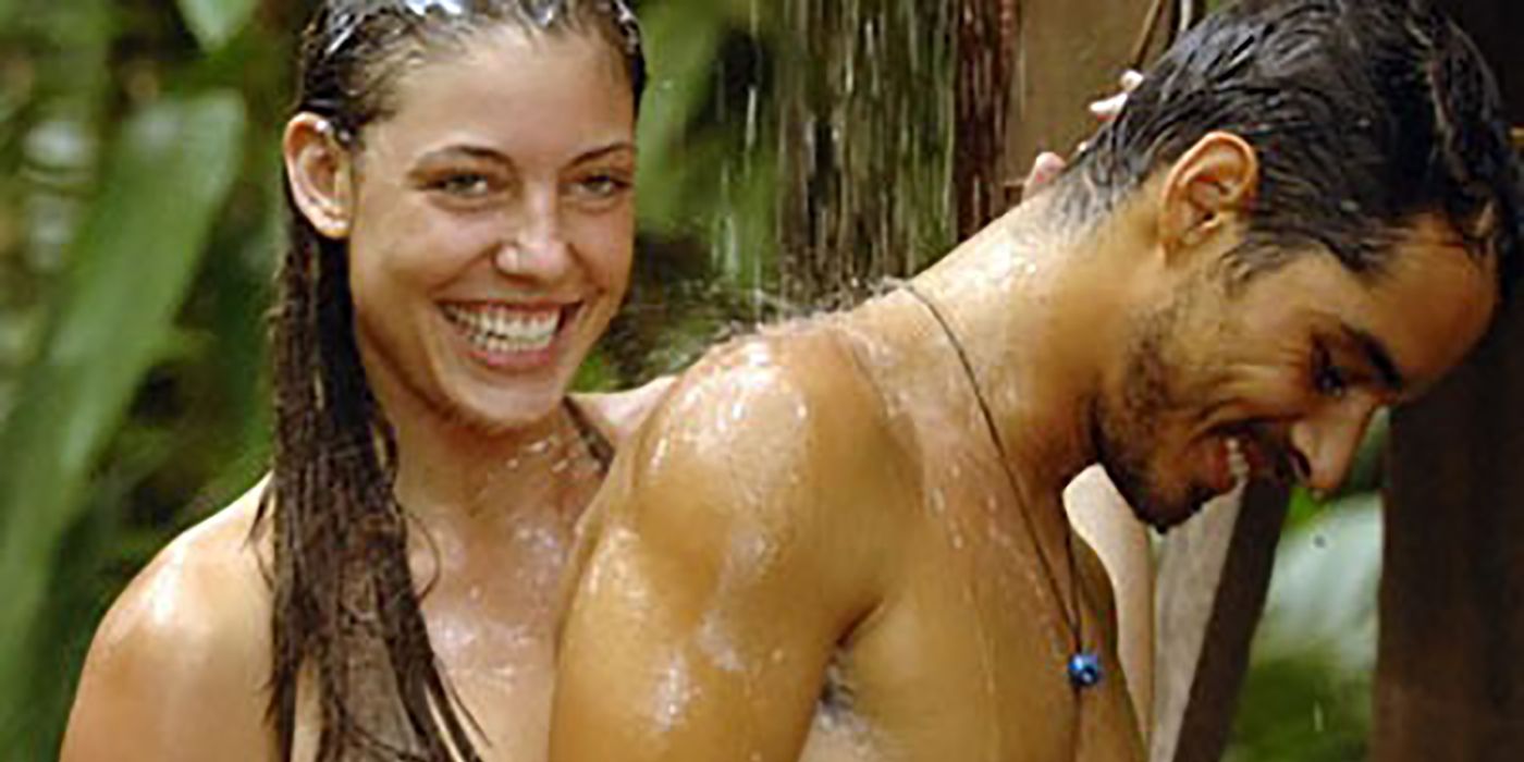Amanda and Ozzy both wet from a shower on the island on Survivor.