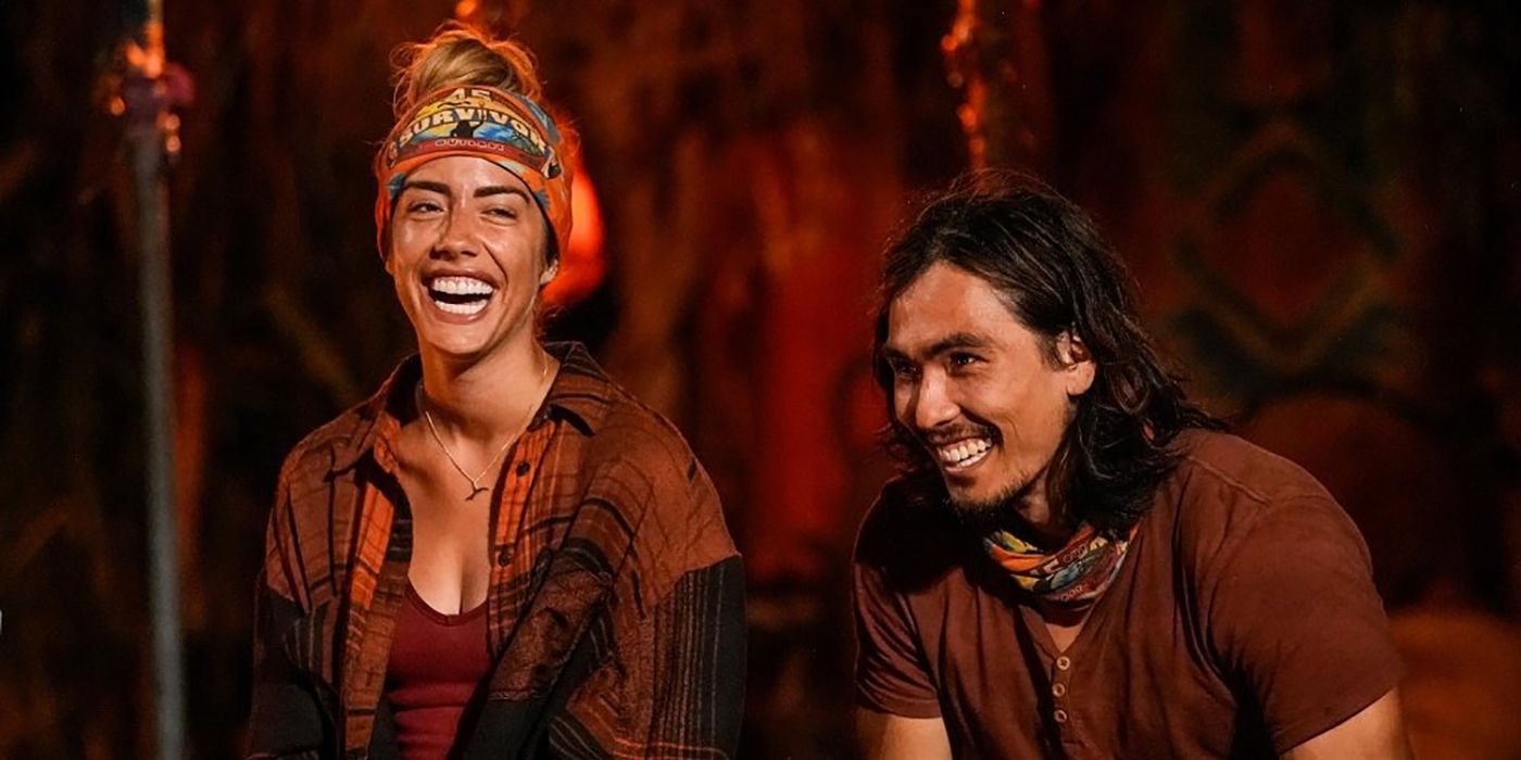 Dee and Austin on the final Tribal Council on Survivor, both smiling and laughing.
