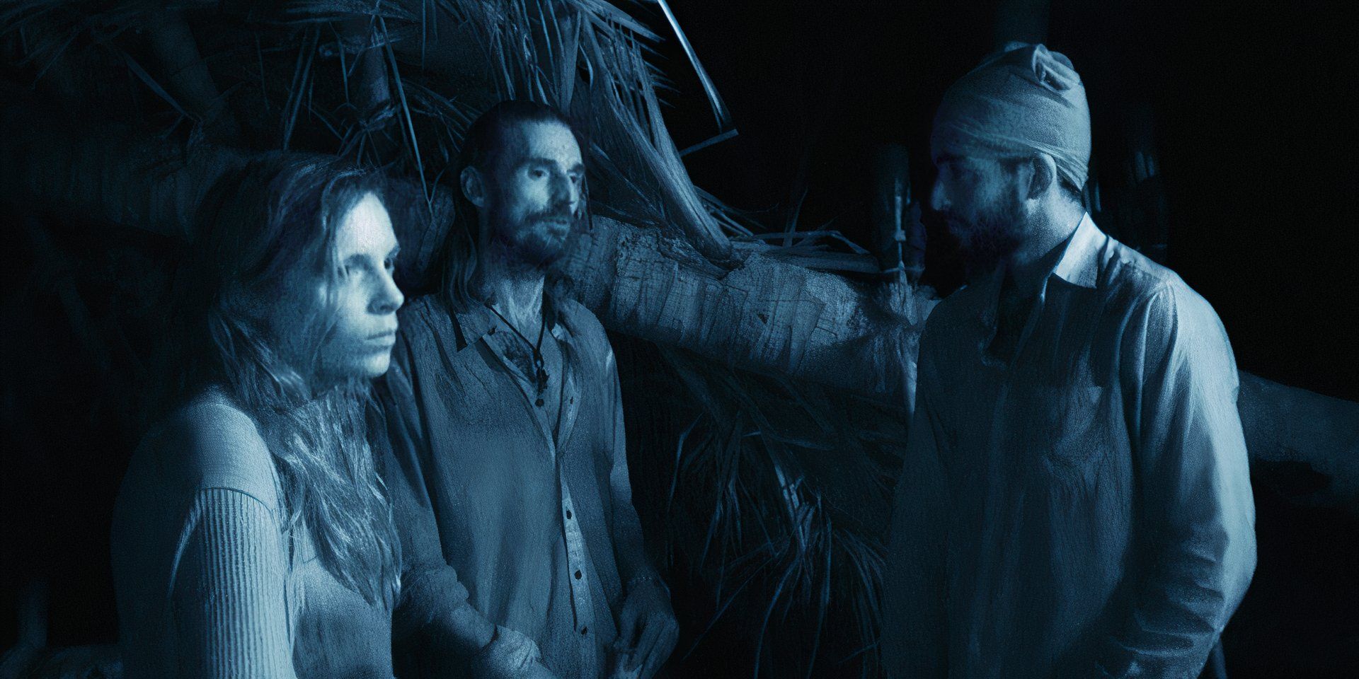 Sophie Clark, Coach Wade, and Albert Destrade standing around at night time in Survivor: South Pacific