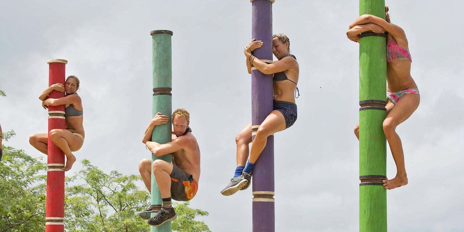 Four contestants competing in the 'Get a Grip' immunity challenge in Survivor: Worlds Apart