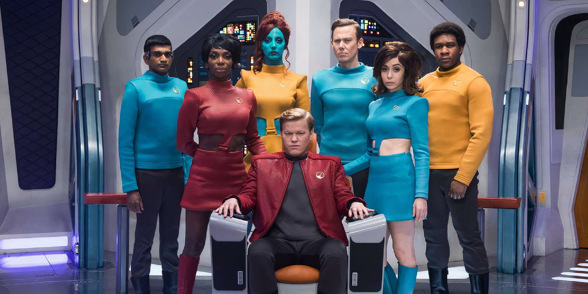 The cast of USS Callister Black Mirror all gathered on the spaceship.