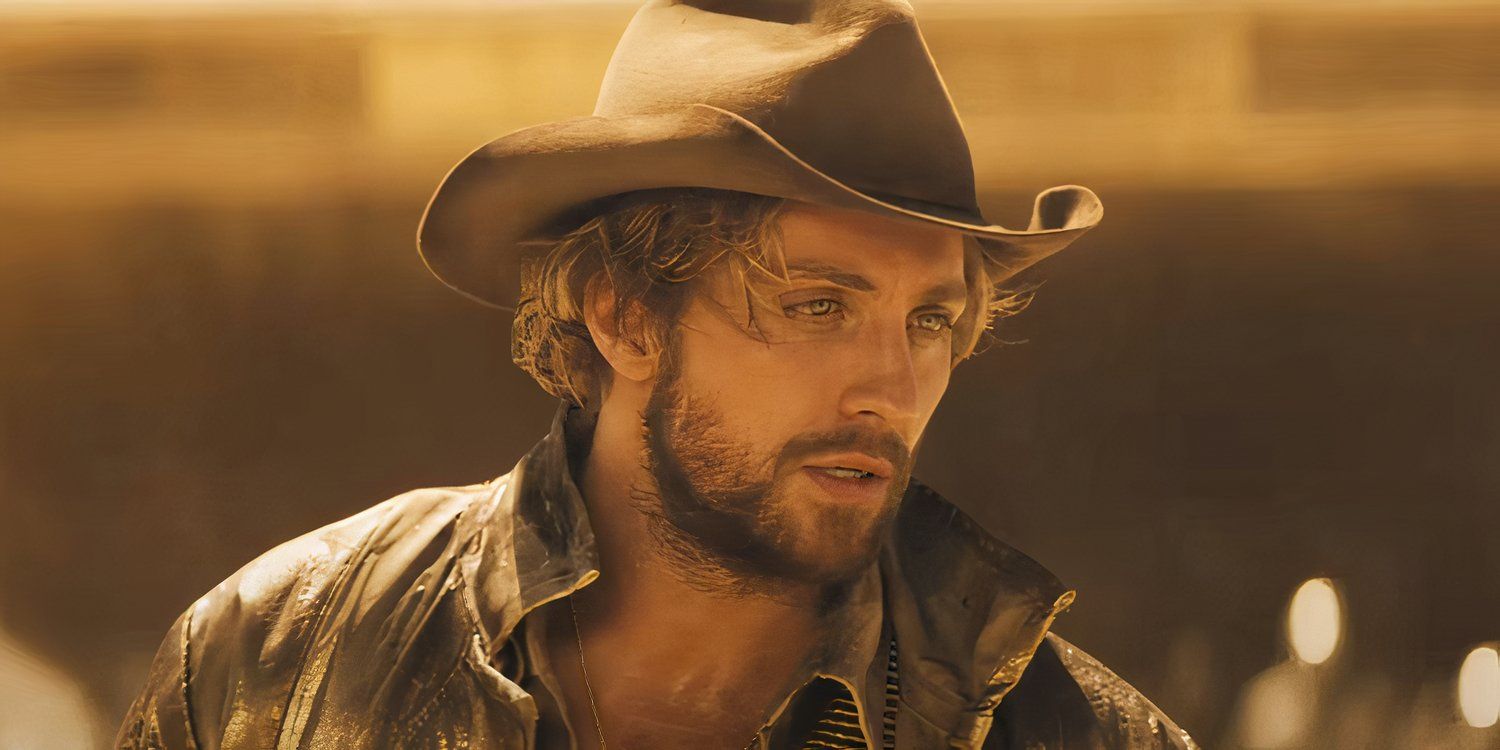 Tom Ryder wearing a cowboy hat in the desert in The Fall Guy