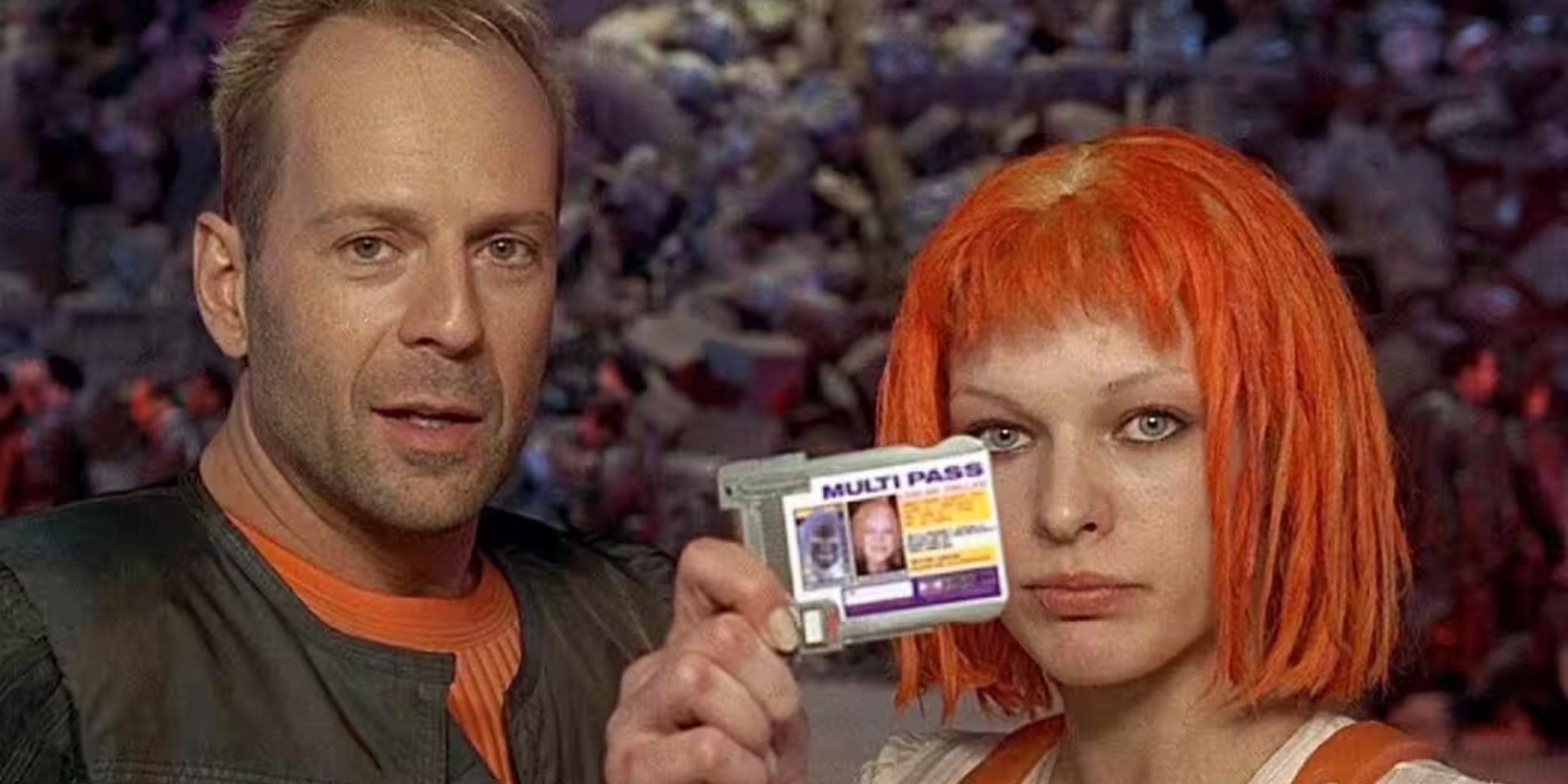 Korben Dallas (Bruce Willis) stands alongside the orange-haired Leeloo (Milla Jovovich) as she flashes her identification in &lsquo;The Fifth Element&rsquo; (1997).