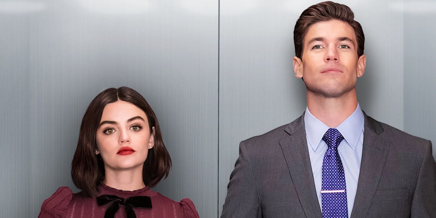 Lucy Hale as Lucy and Auston Stowell as Joshua standing in front of an elevator in The Hating Game
