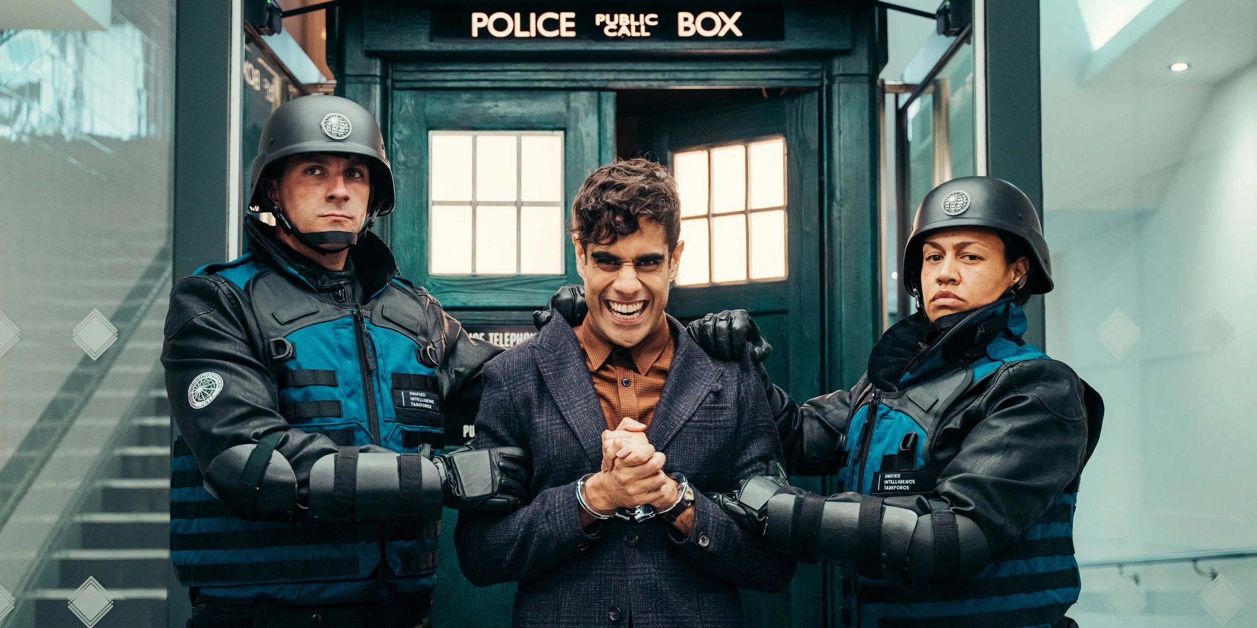 The Master is arrested outside the TARDIS, smiling