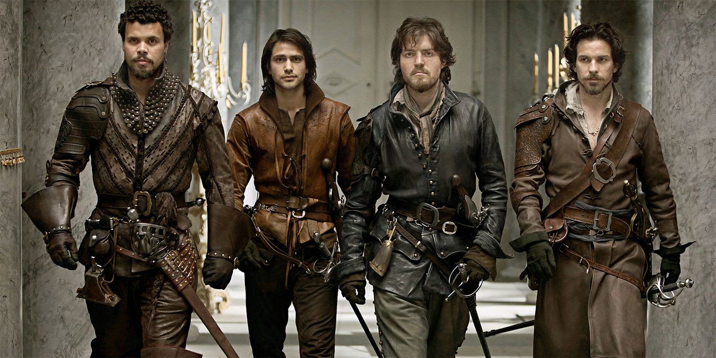 Tom Burke, Howard Charles, Santiago Cabrera, and Luke Pasqualino walking together for The Musketeers