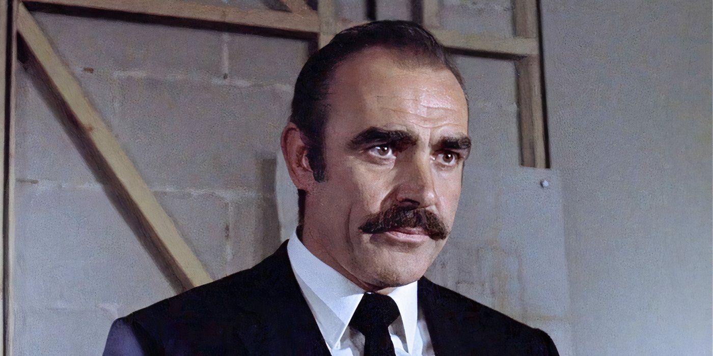 Sean Connery wearing a suit and tie in The Offence