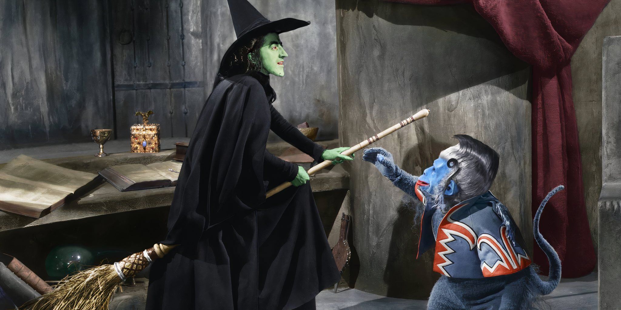 The Wicked Witch on her broom and a flying monkey in 'The Wizard of Oz'