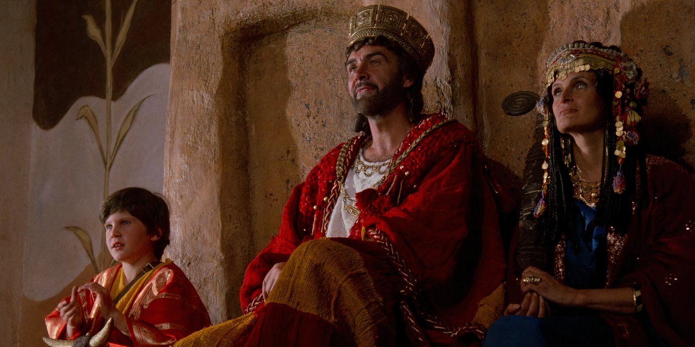Kevin sits with King Agamemnon and Queen Clytemnestra