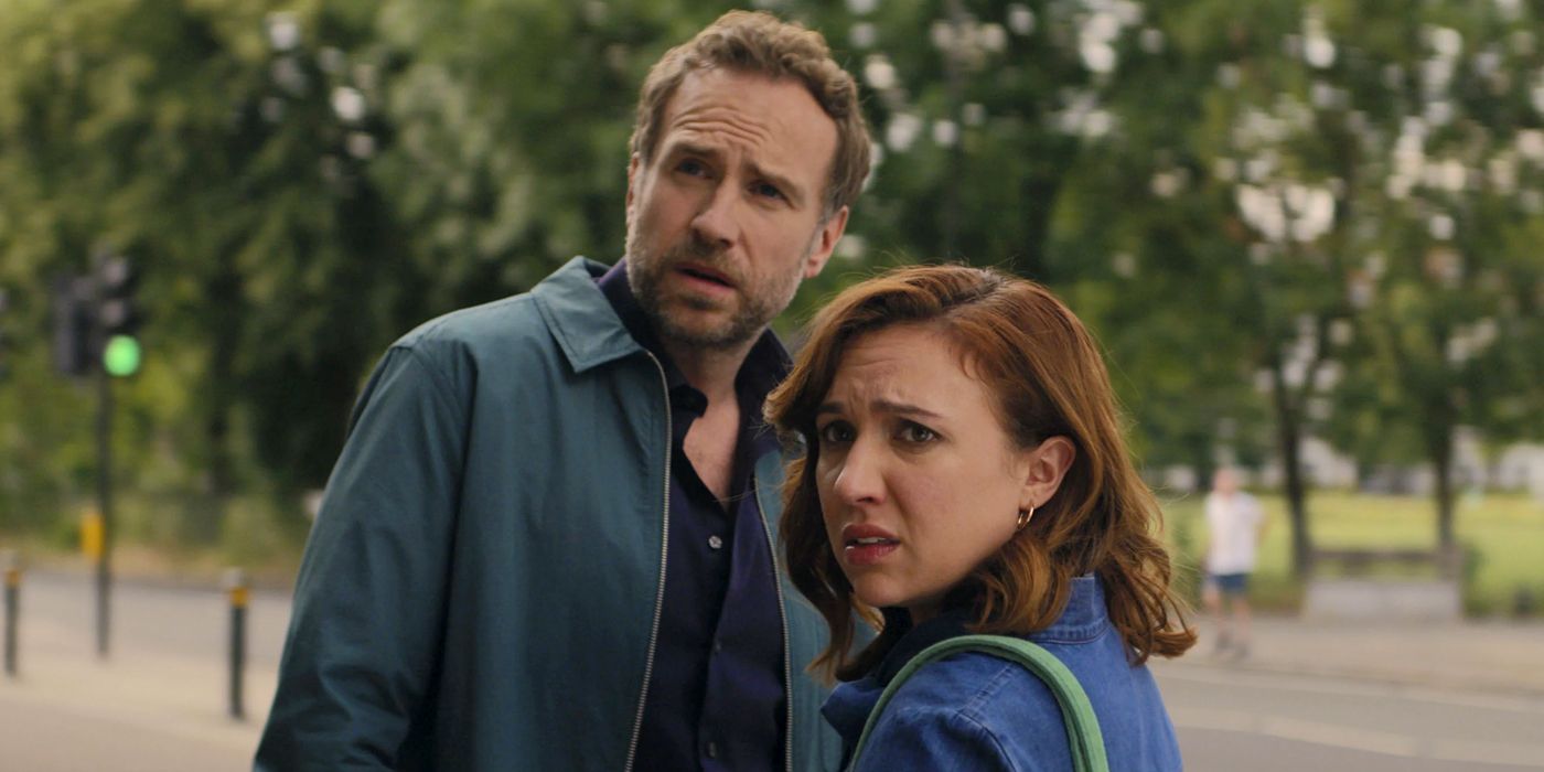 Rafe Spall and Esther Smith look confused in a scene from Trying Season 4