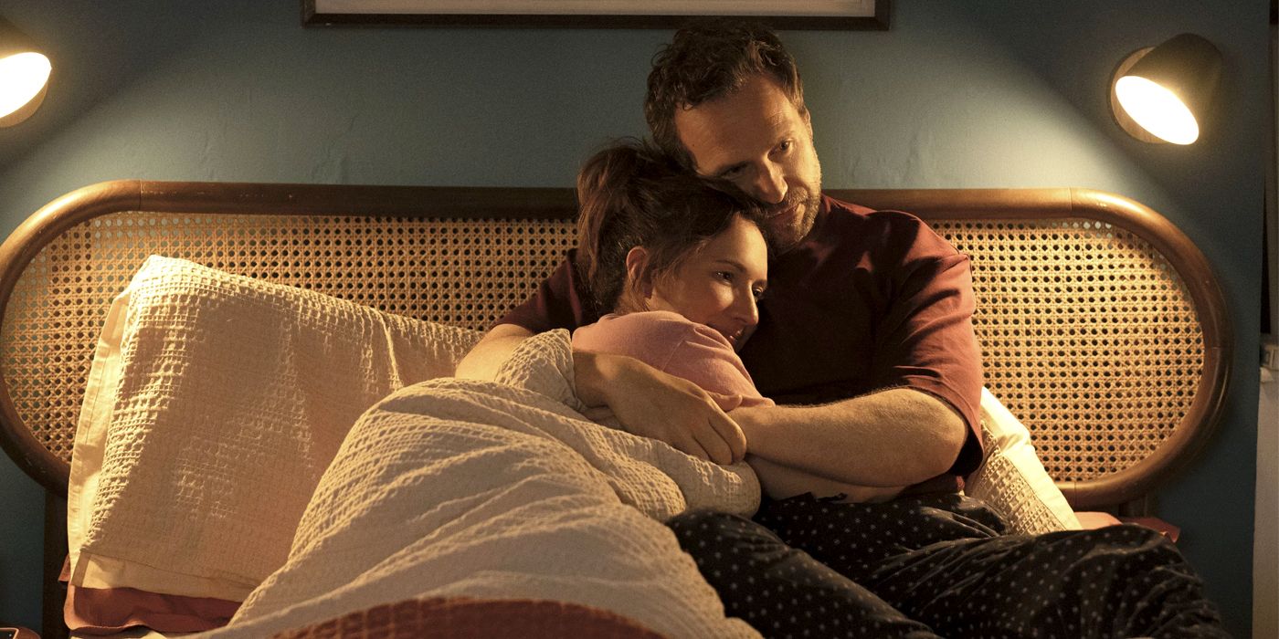 Rafe Spall hugs Esther Smith in a scene from Trying Season 4 on Apple TV+