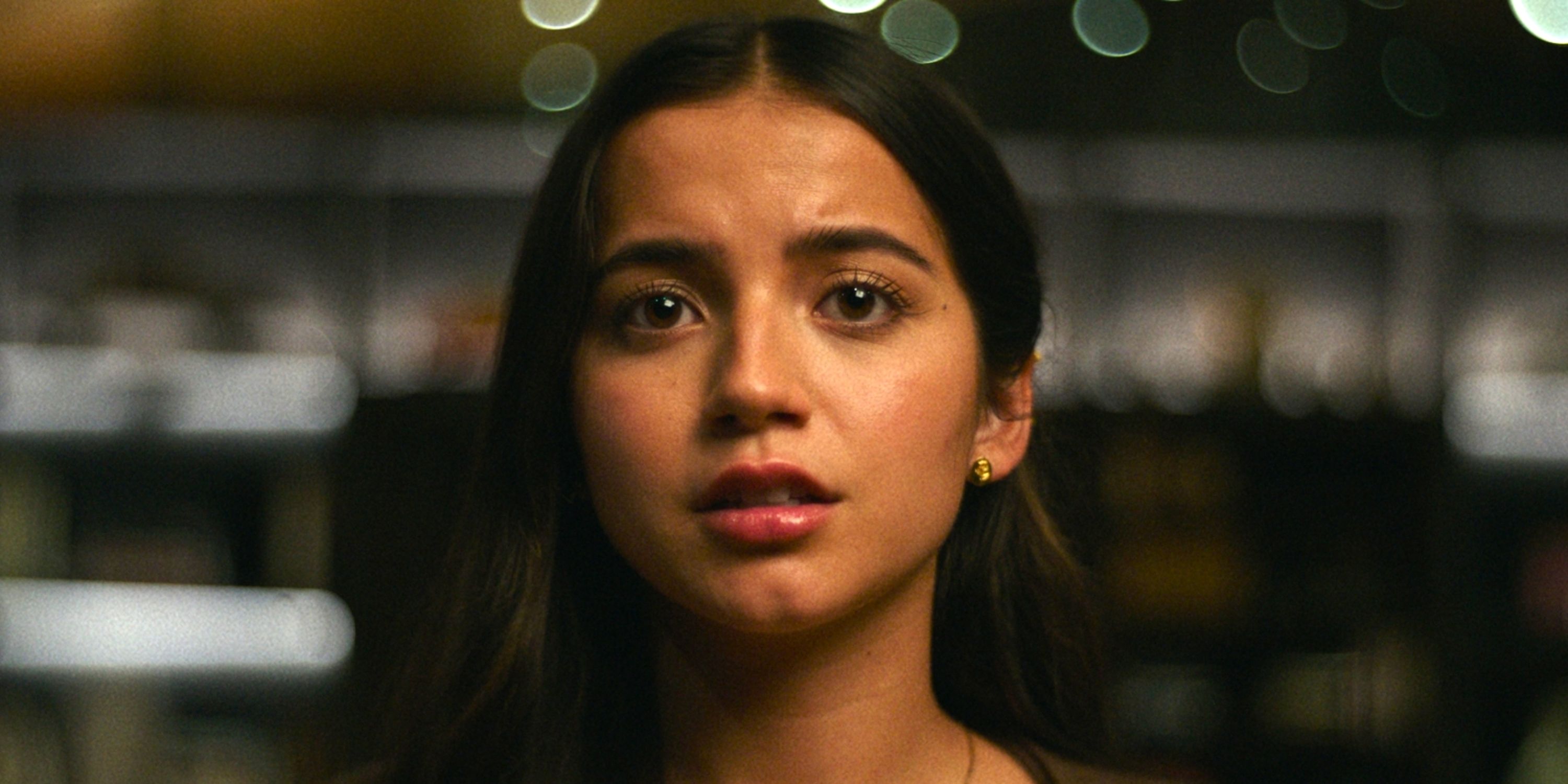 Isabela Merced as Aza in closeup and looking into the camera in Max's Turtles All the Way Down