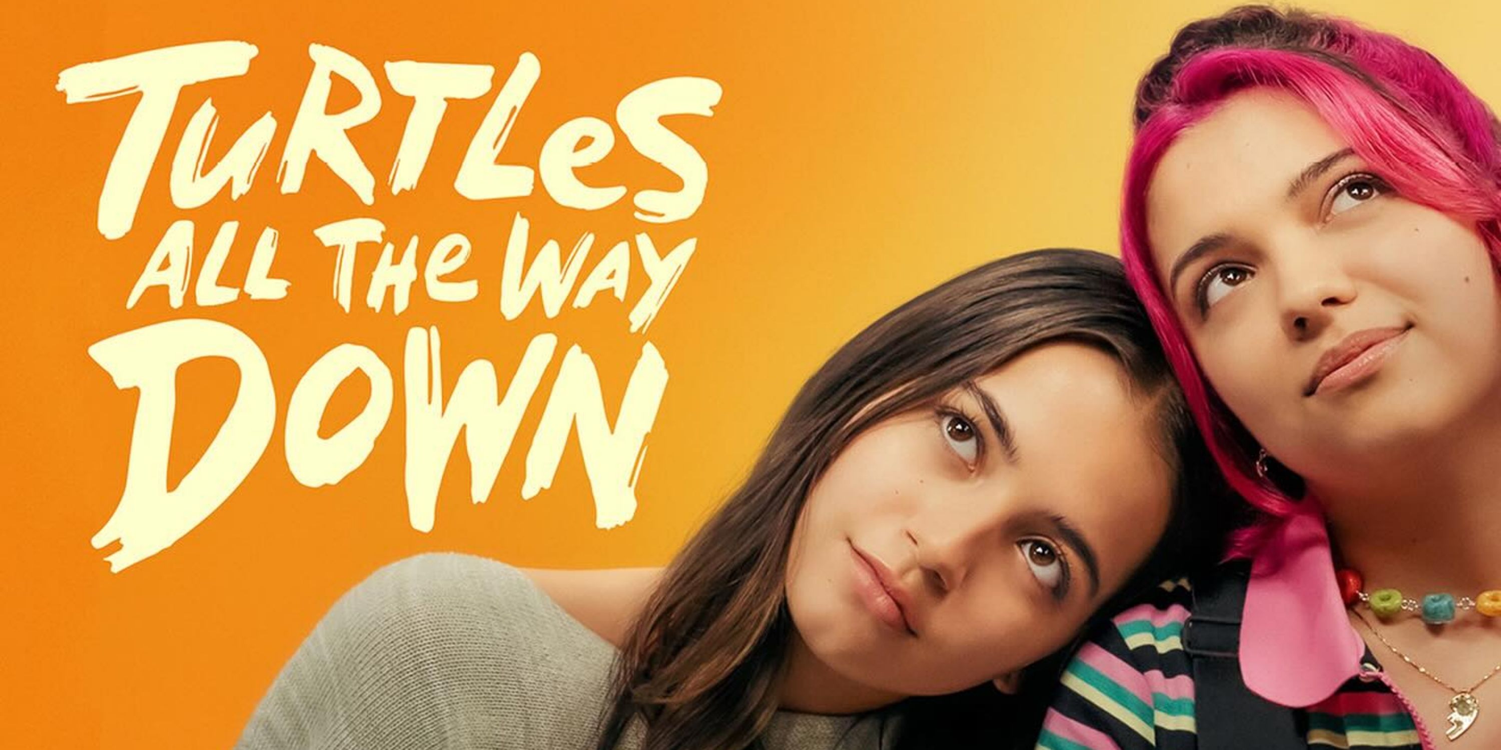 Isabela Merced as Aza leaning on the right shoulder of Cree as Daisy in Max's Turtles All the Way Down