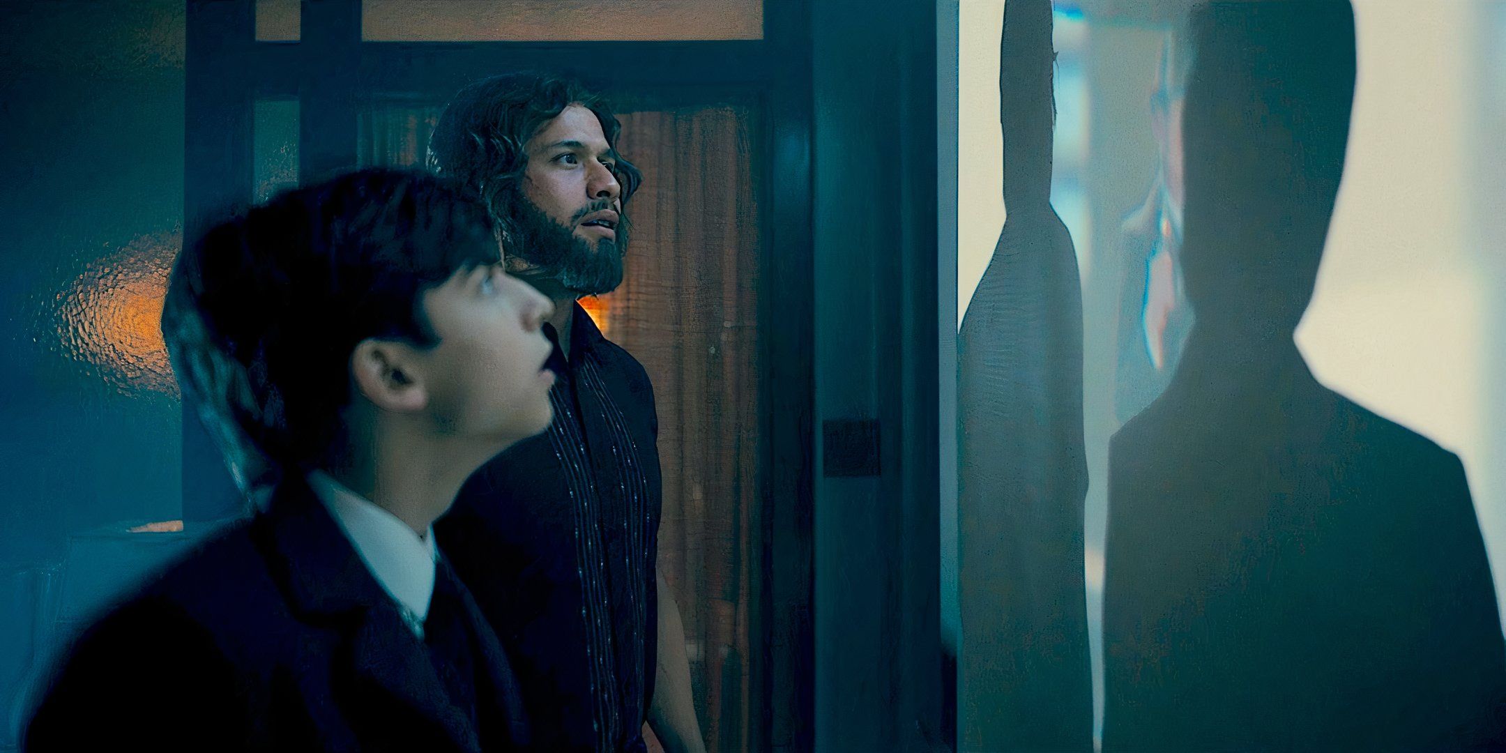 Five (Aiden Gallagher) and Diego (David Casta?eda) watch the Frankel Footage in Season 2, Episode 2 of The Umbrella Academy