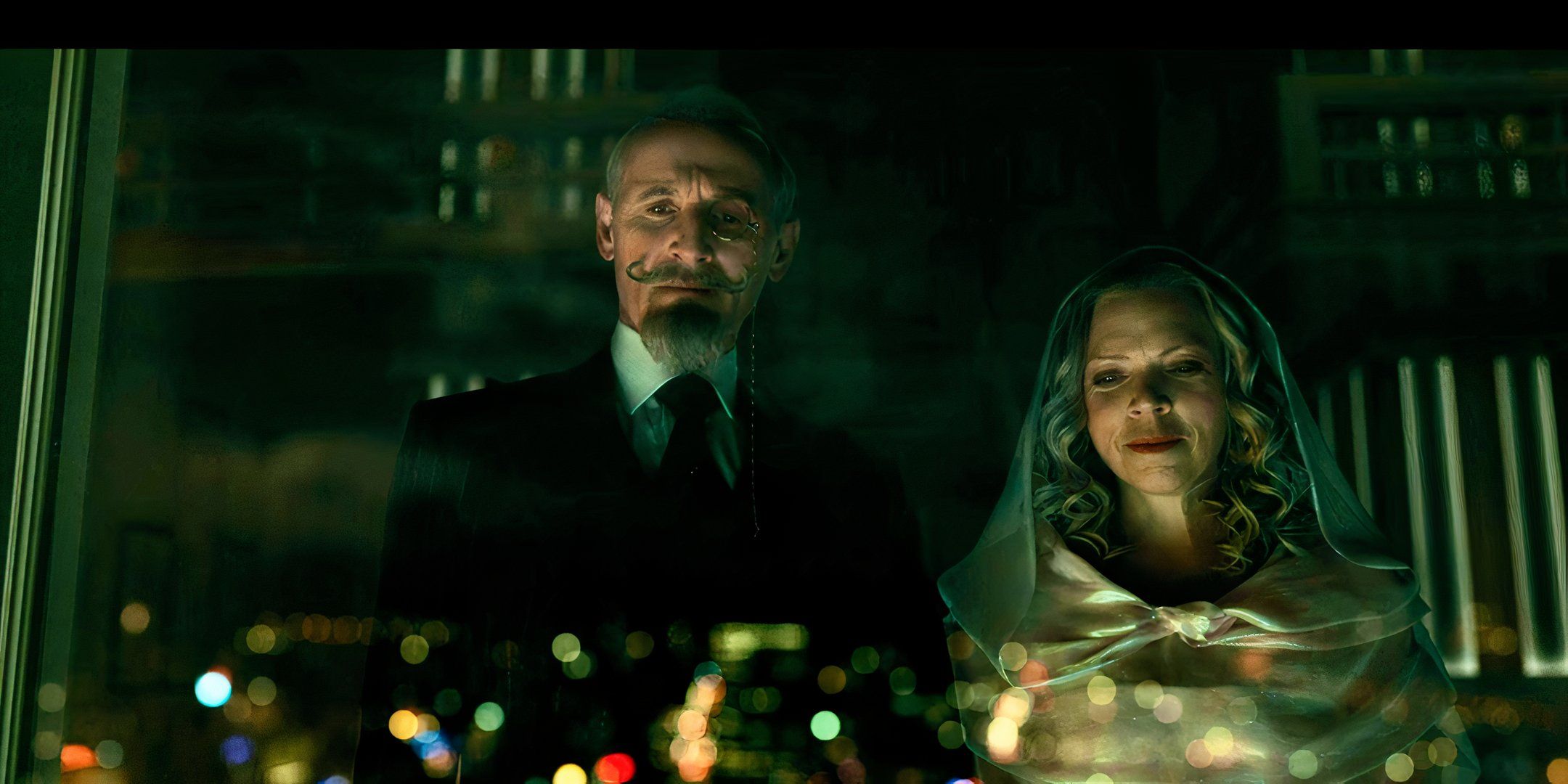 Reginald Hargreeves (Colm Feore) and his wife, Abigail Hargreeves (Liisa Repo-Martell) survey the new timeline from their skyscraper in Season 3, Episode 10 of The Umbrella Academy