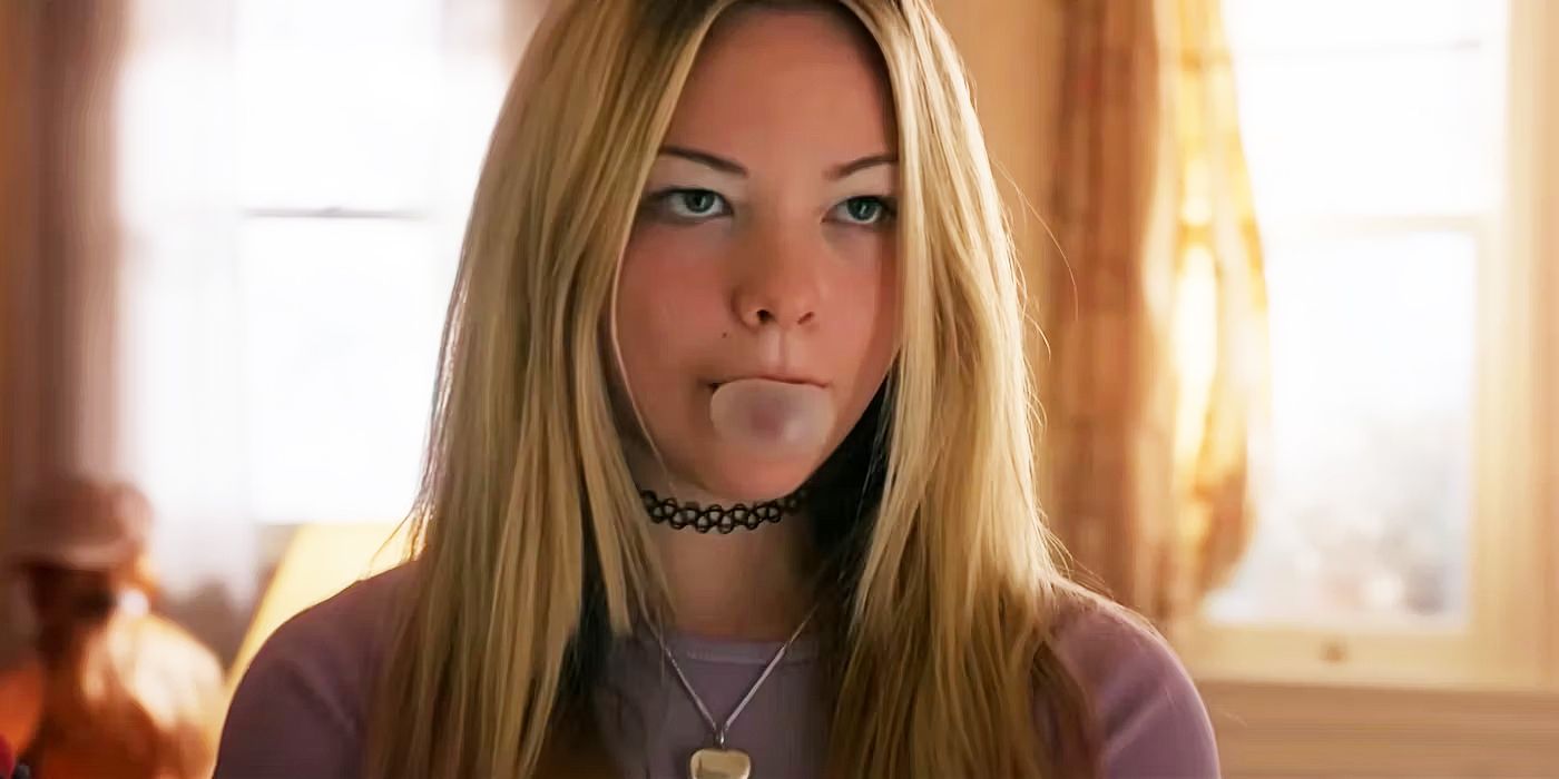 Chloe Guidry in Under the Bridge blowing a bubble with gum
