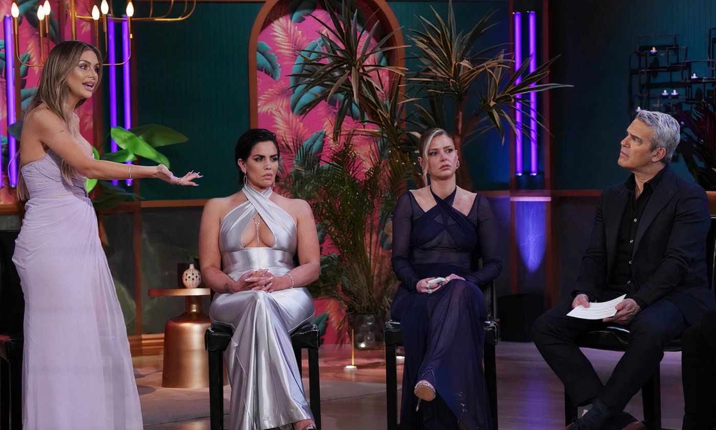 Lala Kent stands up as Katie Maloney, Ariana Madix, and Andy Cohen sit for the 'Vanderpump Rules' Season 11 reunion