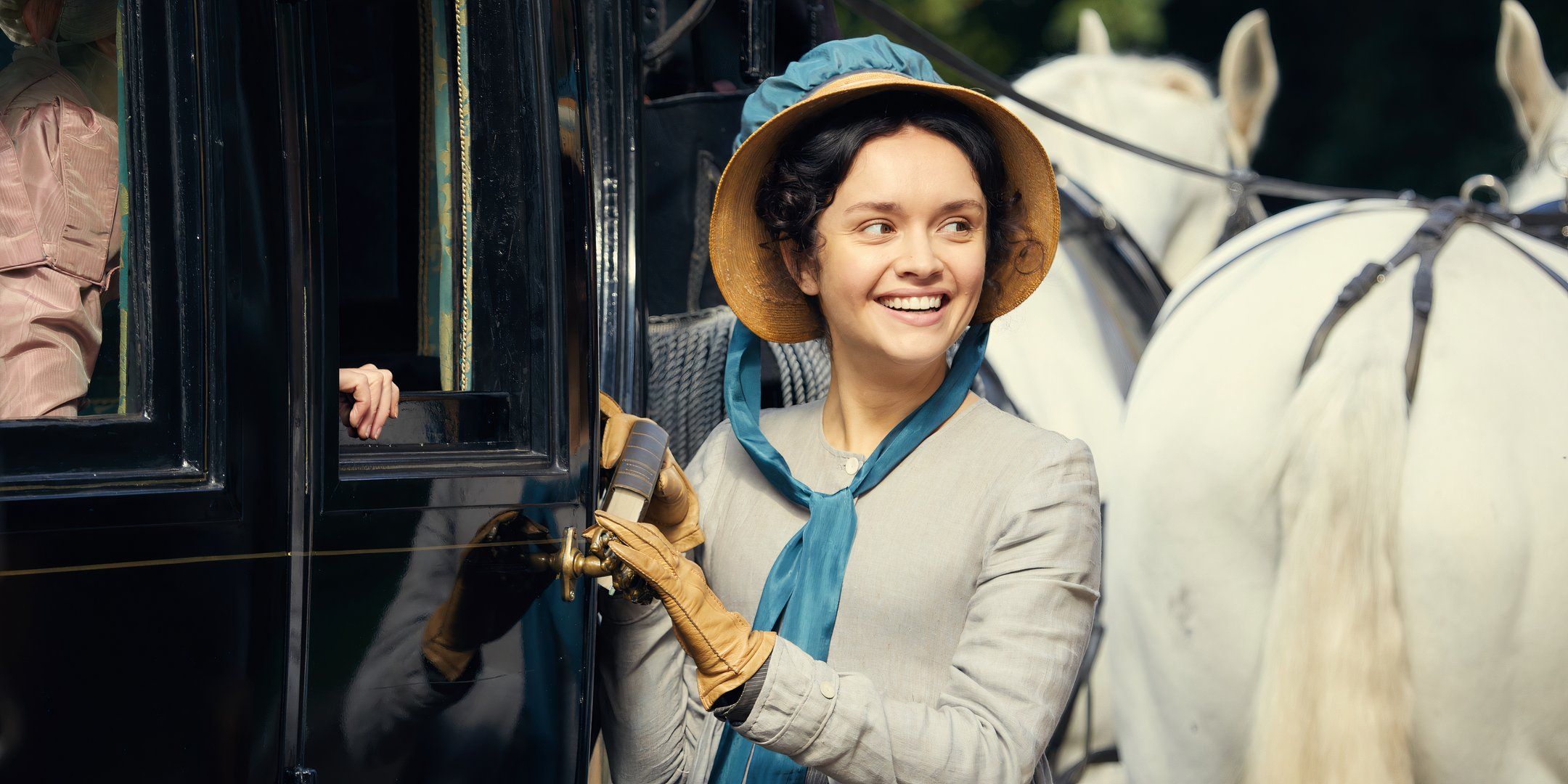 Olivia Cooke as Becky Sharpe getting out of carriage in Vanity Fair.