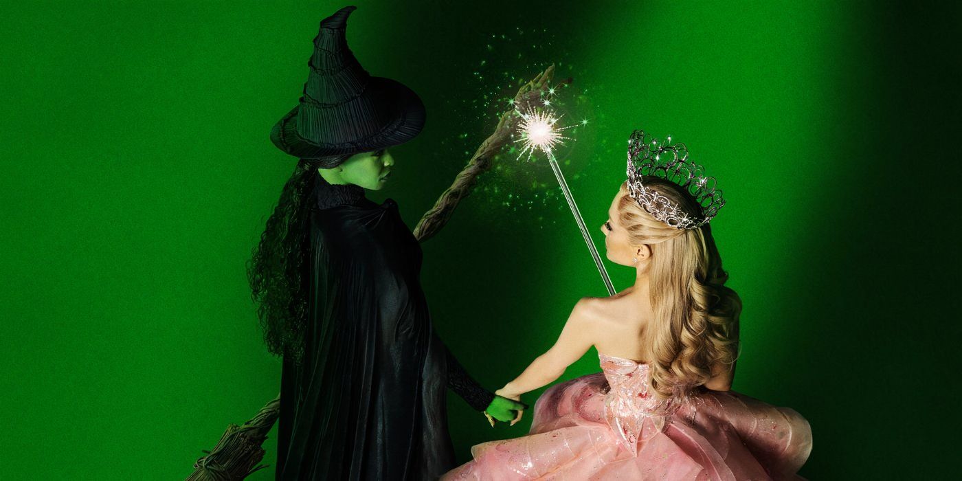 Cynthia Erivo and Ariana Grande as Elphaba and Glinda holding hands and touching wands amidst a green background.