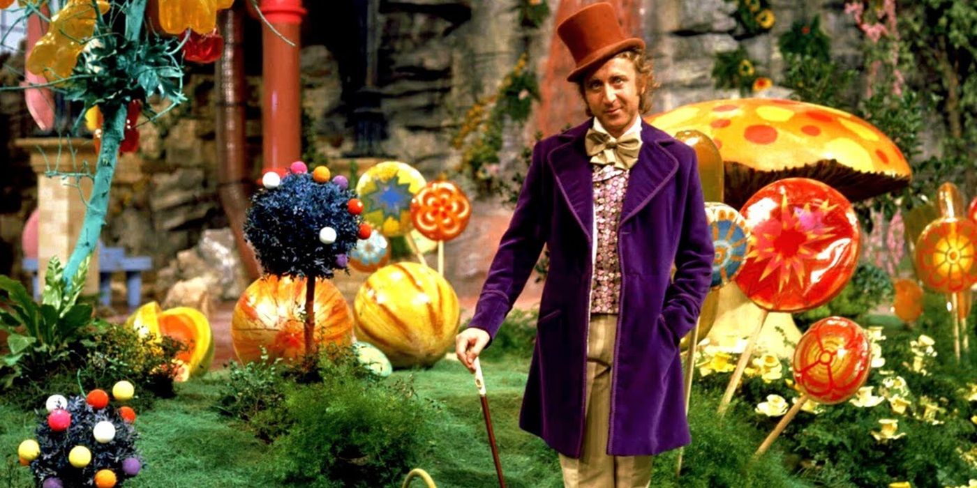 Willy Wonka (Gene Wilder) stands in front of his larger-than-life candy landscape in his factory