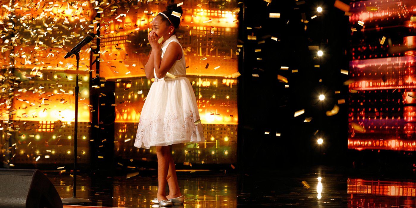 Young opera singer getting the golden buzzer on America's Got Talent