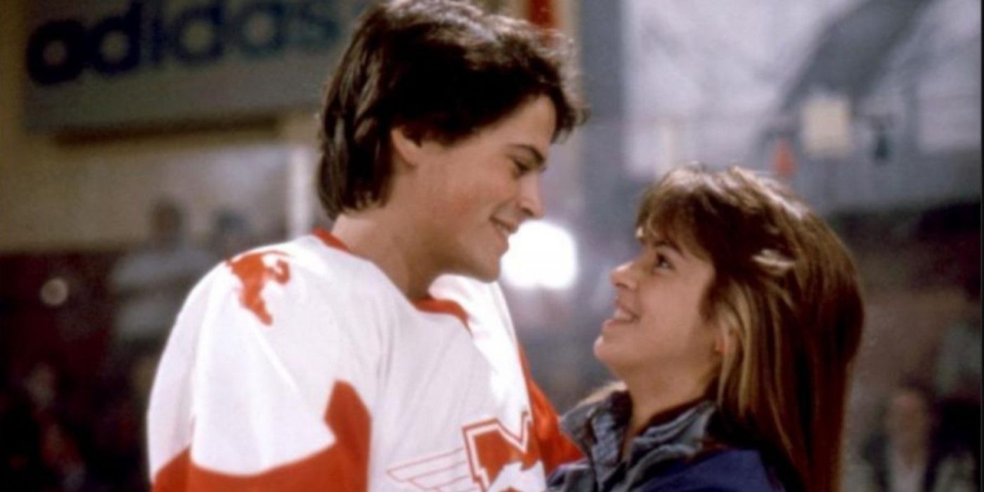 Rob Lowe as Dean Youngblood and Cynthia Gibb as Jessie Chadwick looking at each other in 'Youngblood'