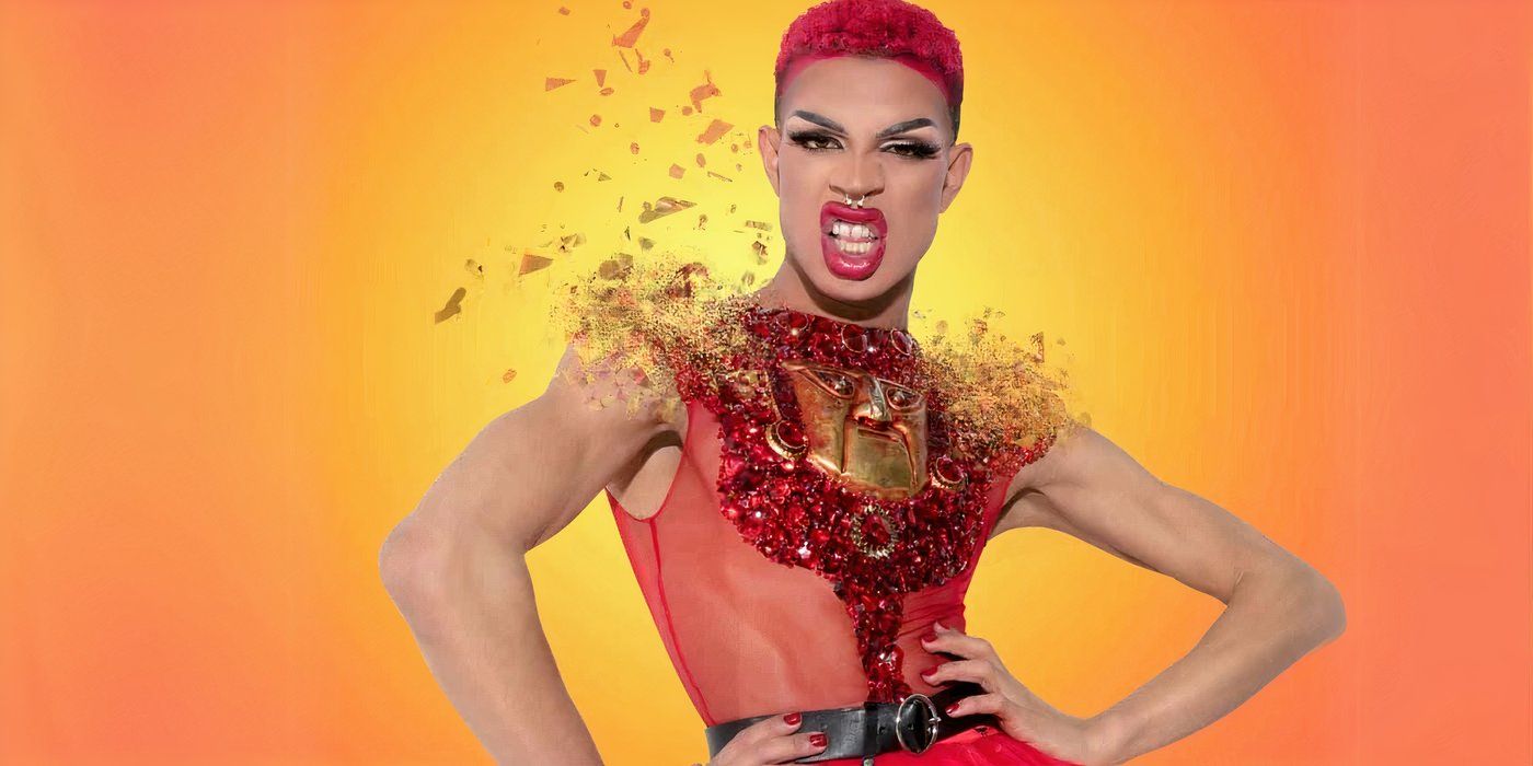 Yvie Oddly posing with hands on her hops in a red ruby studded outfit