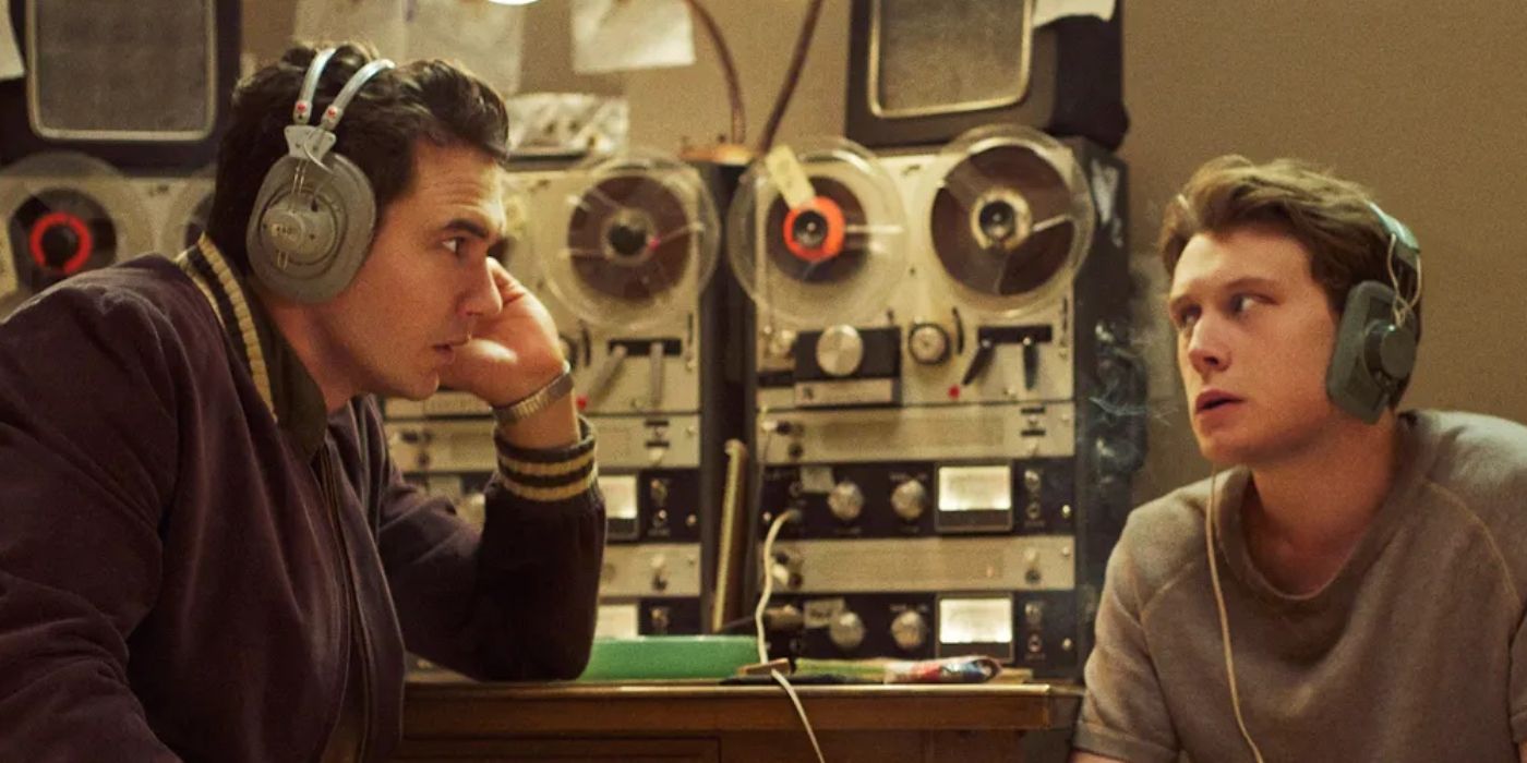 James Franco and George McKay listen to tapes with retro headphones in 11.22.63.