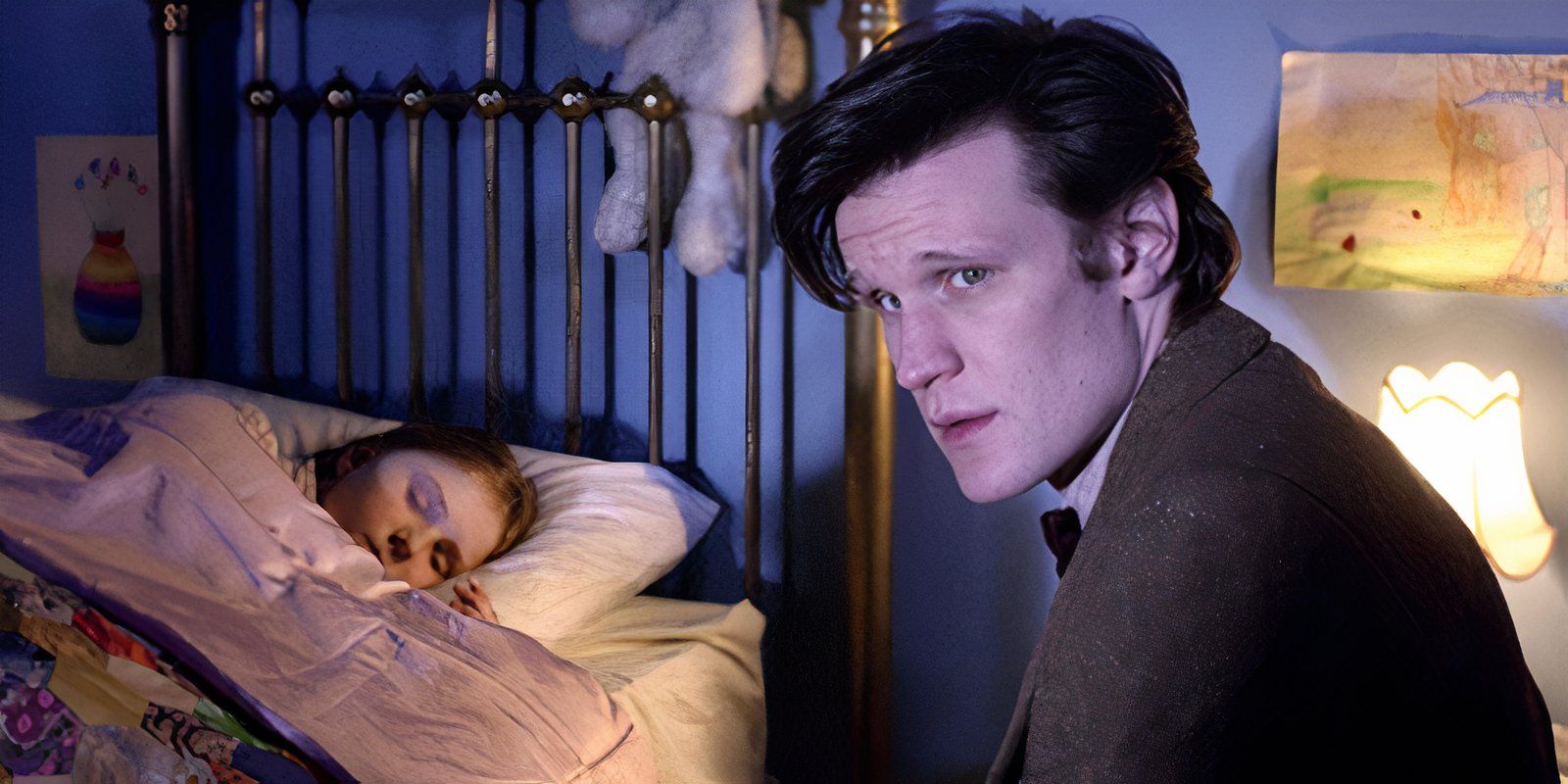 11th Doctor next to sleeping child Amy Pond in 'The Big Bang' from 'Doctor Who'