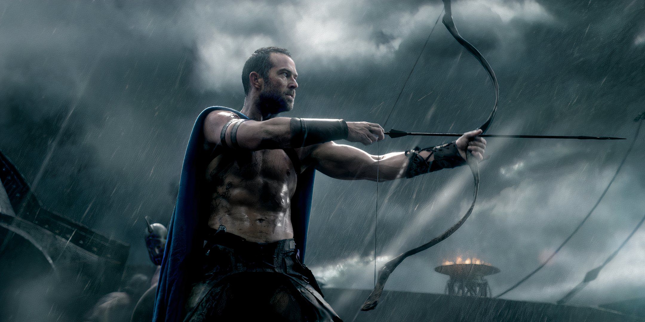 Sullivan Stapleton as Themistocles shooting a arrow in 300: Rise of an Empire.
