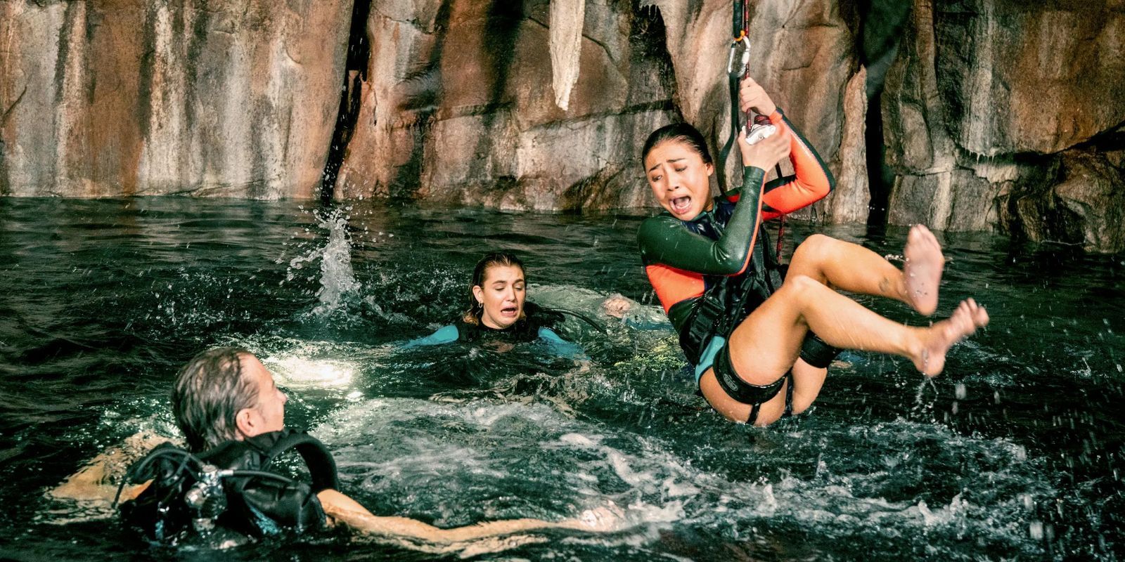 Scuba divers frantically try to escape the water