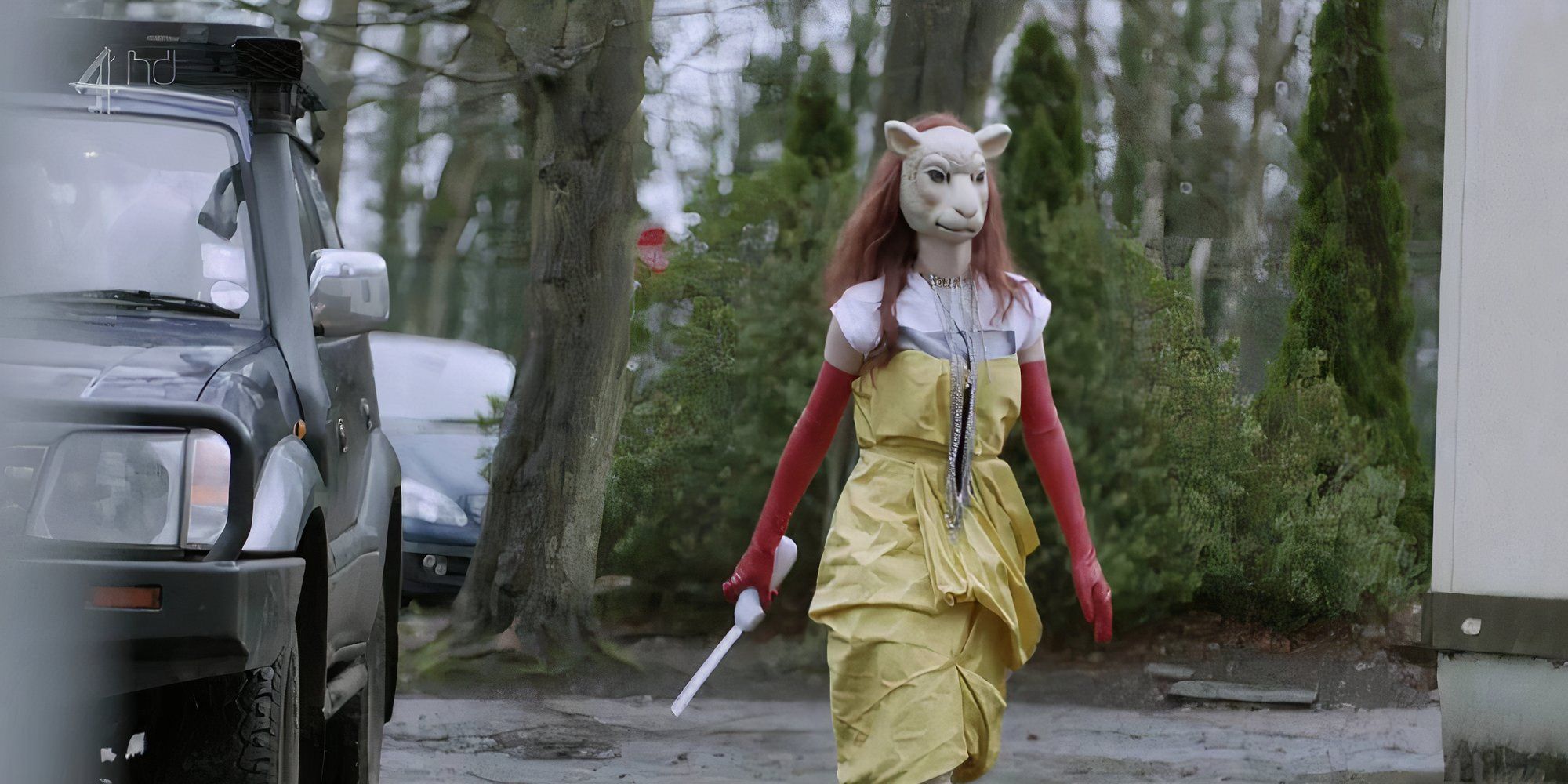 A girl holding a gun with a bunny mask in Black Mirror White Bear