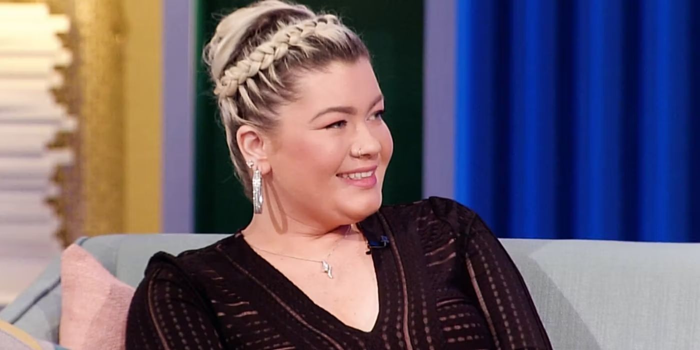 Amber Portwood smiling on a couch at a Teen mom reunion