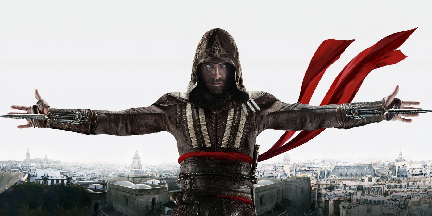 Michael Fassbender as Aguilar stands with his arms outstretched and his hidden blades extended. His right ring finger is missing. 