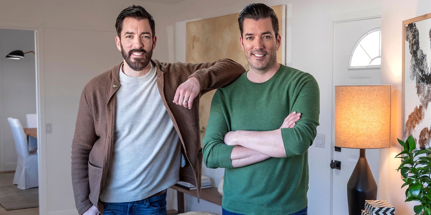 Drew Scott rests his arm on his brother Jonathan Scott's shoulder in a still from Backed by the Bros on HGTV