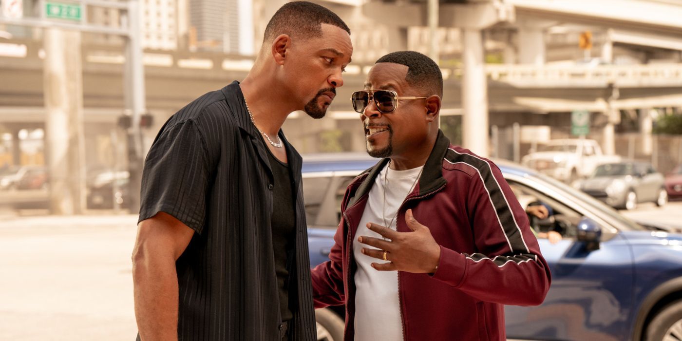 Will Smith and Martin Lawrence as Mike and Marcus talking outside their car under an overpass in Bad Boys: Ride or Life.