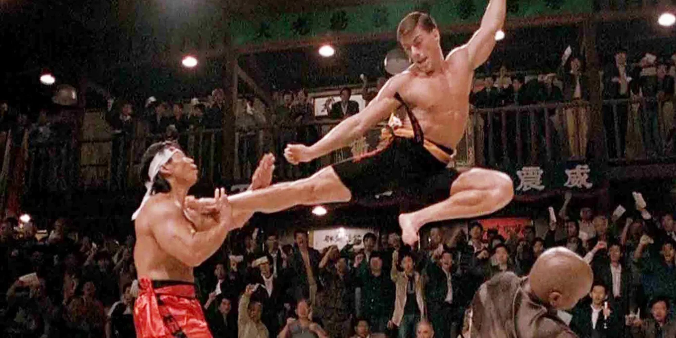 A man throwing a high kick at another man on the ring in Bloodsport