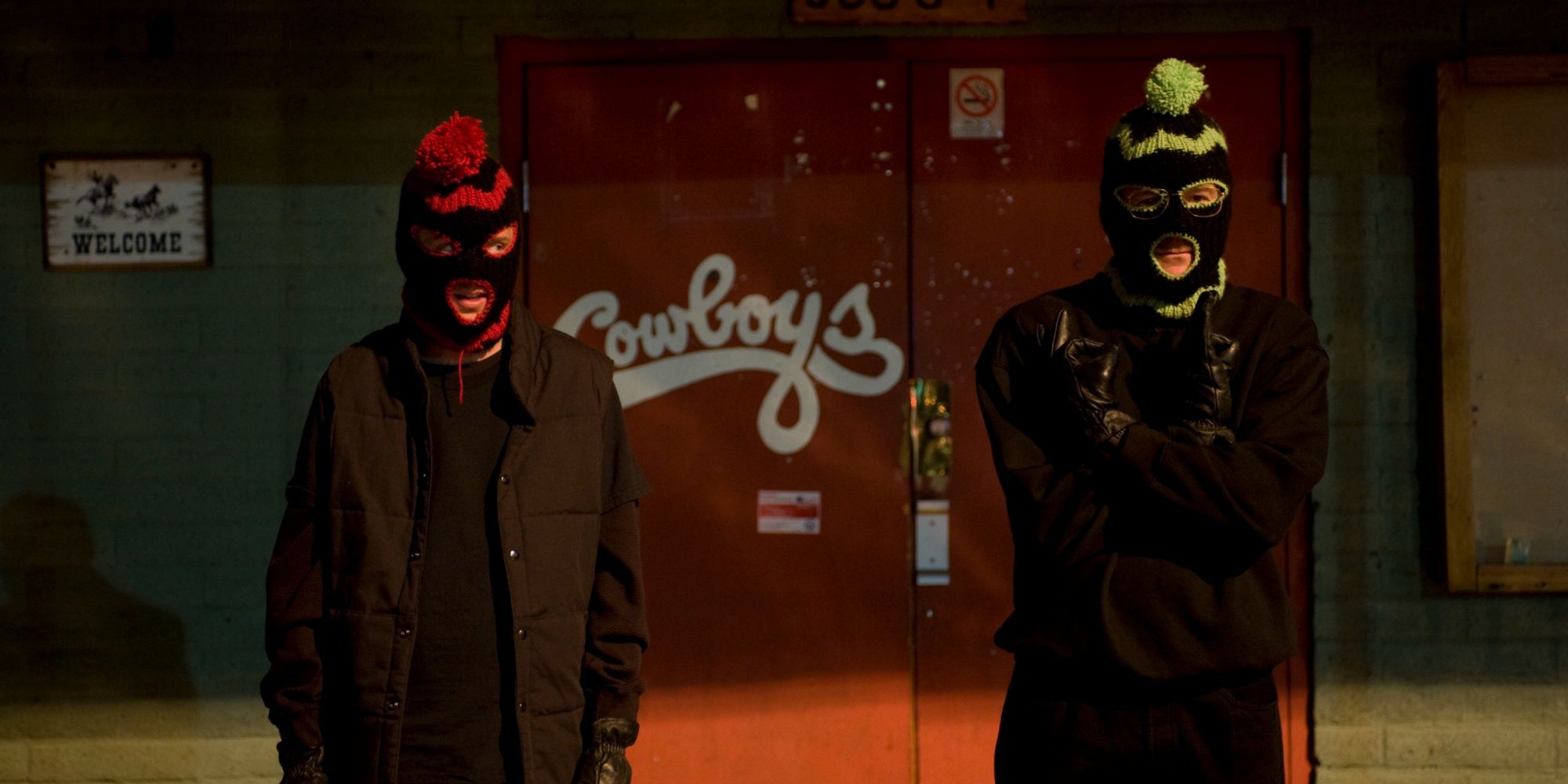 Jesse Pinkman (Aaron Paul) and Walter White (Bryan Cranston) wear masks in Breaking Bad